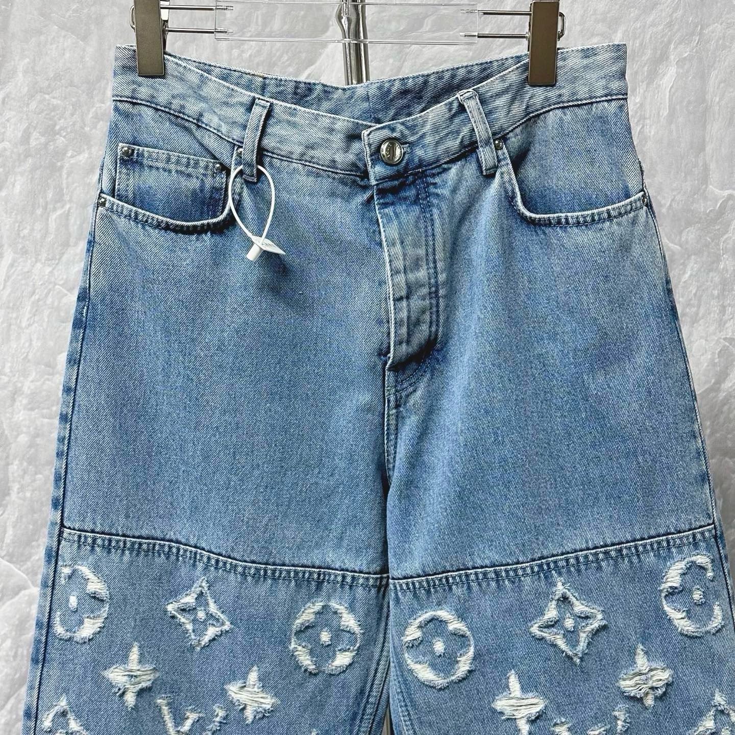 Louis Vuitton SS25 Distressed Logo Denim Pants — front
