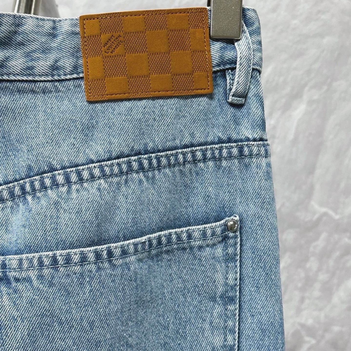 Louis Vuitton SS25 Distressed Logo Denim Pants — detail