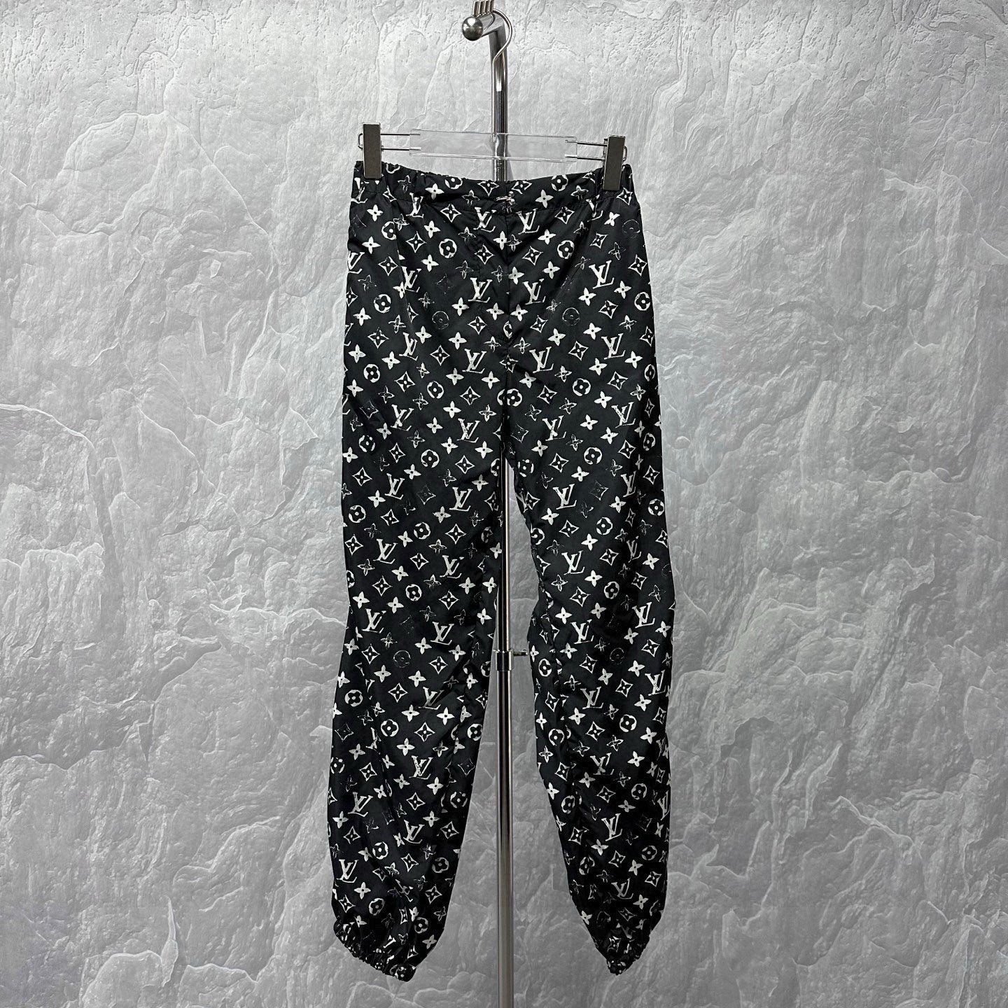 Louis Vuitton Distressed Monogram Jogger Pants — front