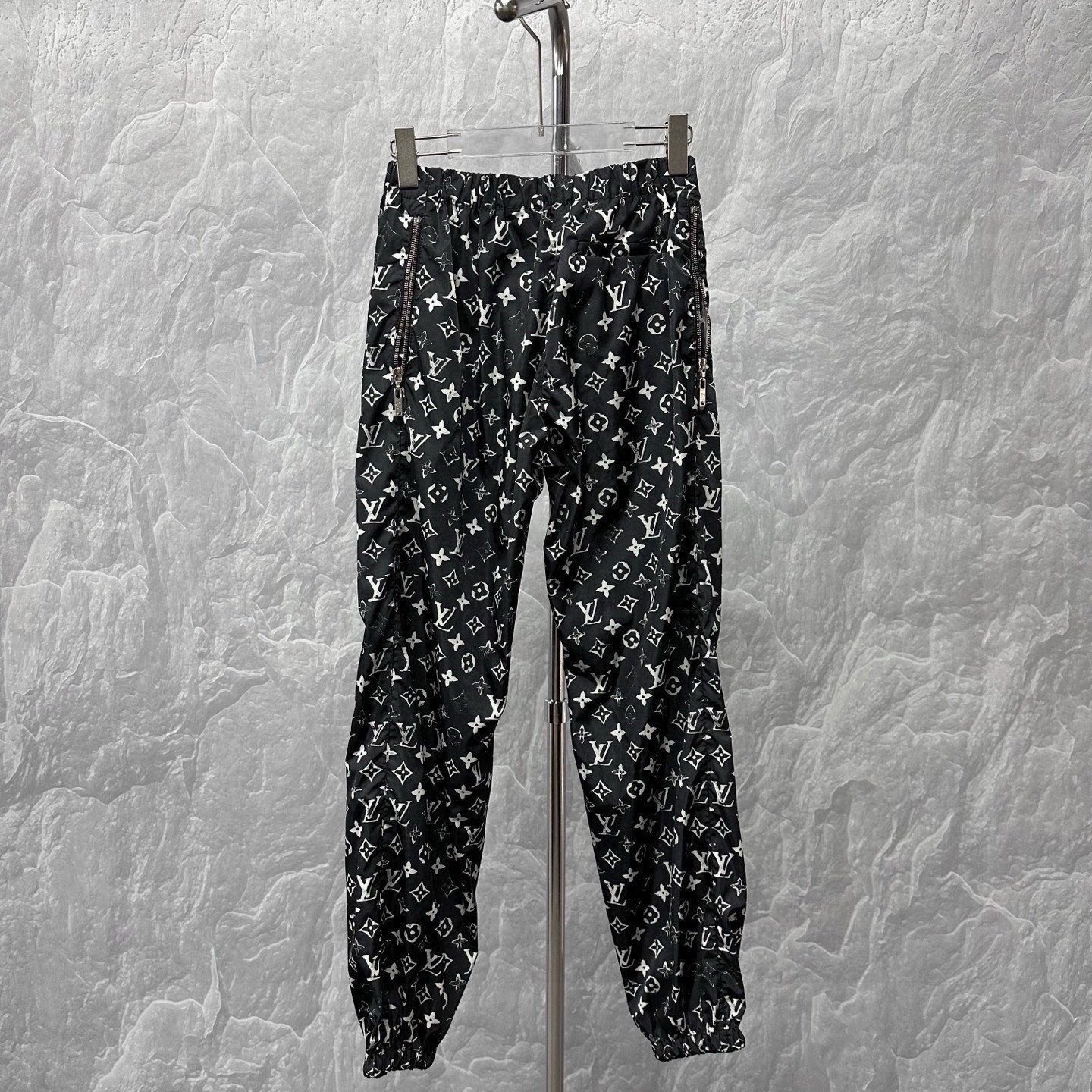Louis Vuitton Distressed Monogram Jogger Pants — label