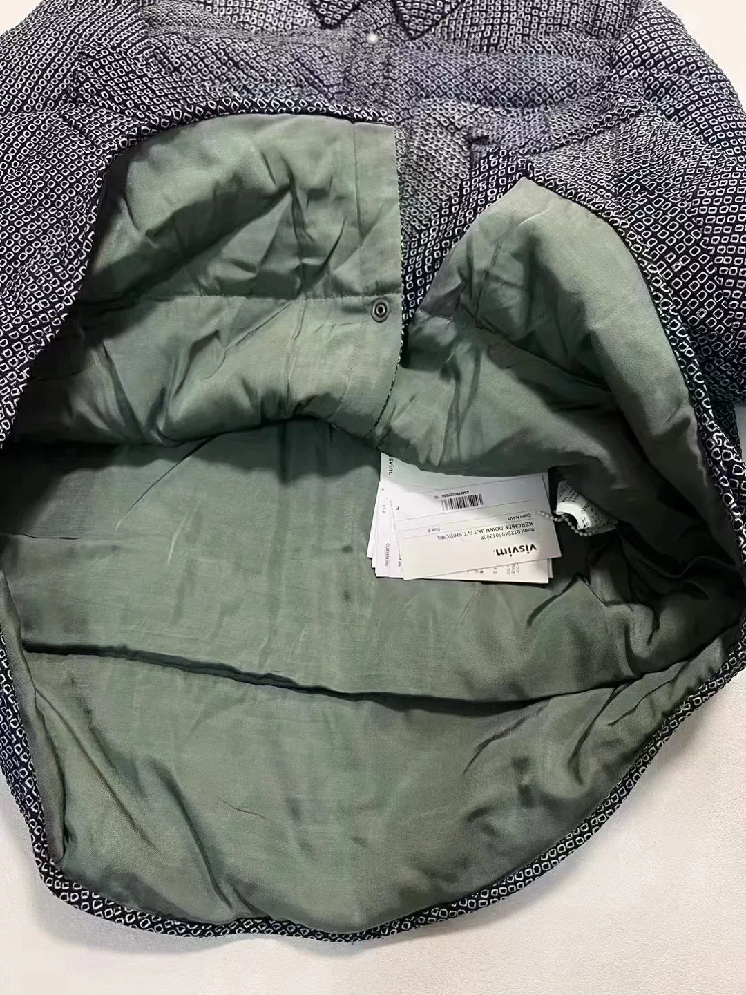 VISVIM 23AW Kerchief Down JKT — label