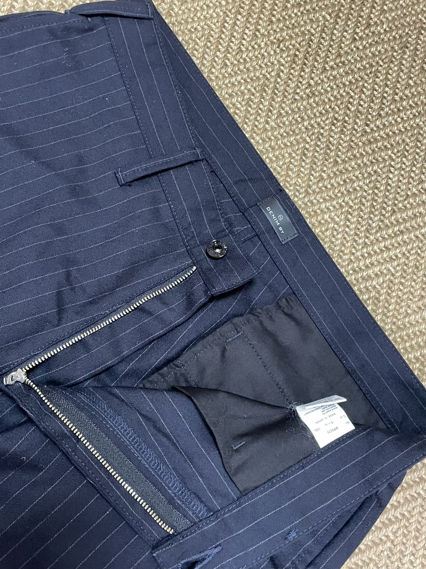 Vanquish & Fragment Denim Casual Pants — label