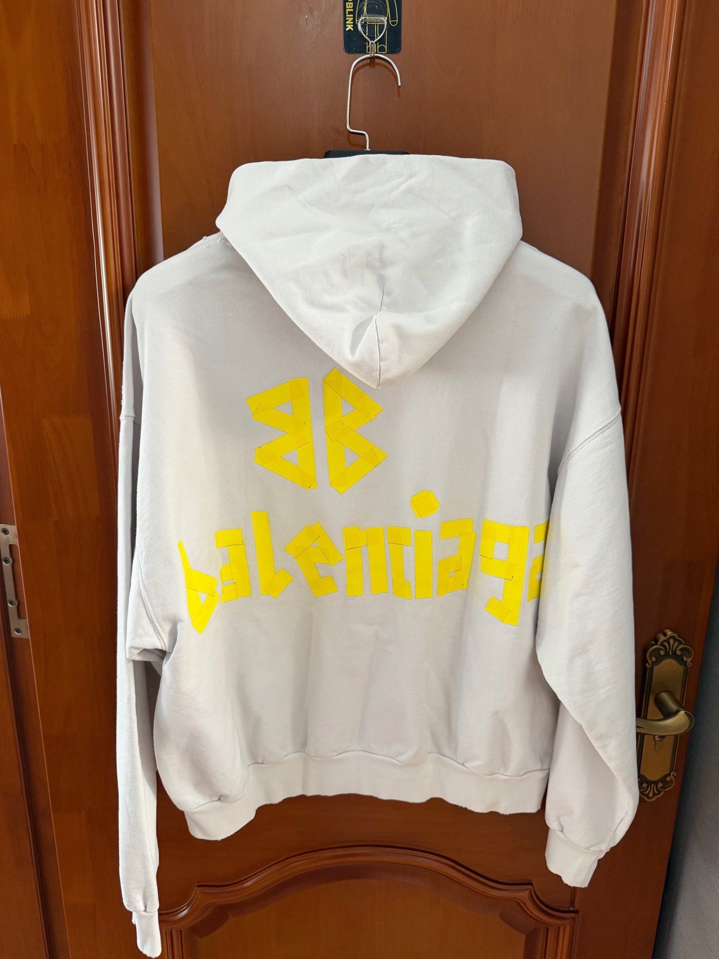 Balenciaga Tape Logo Print Hoodie — front