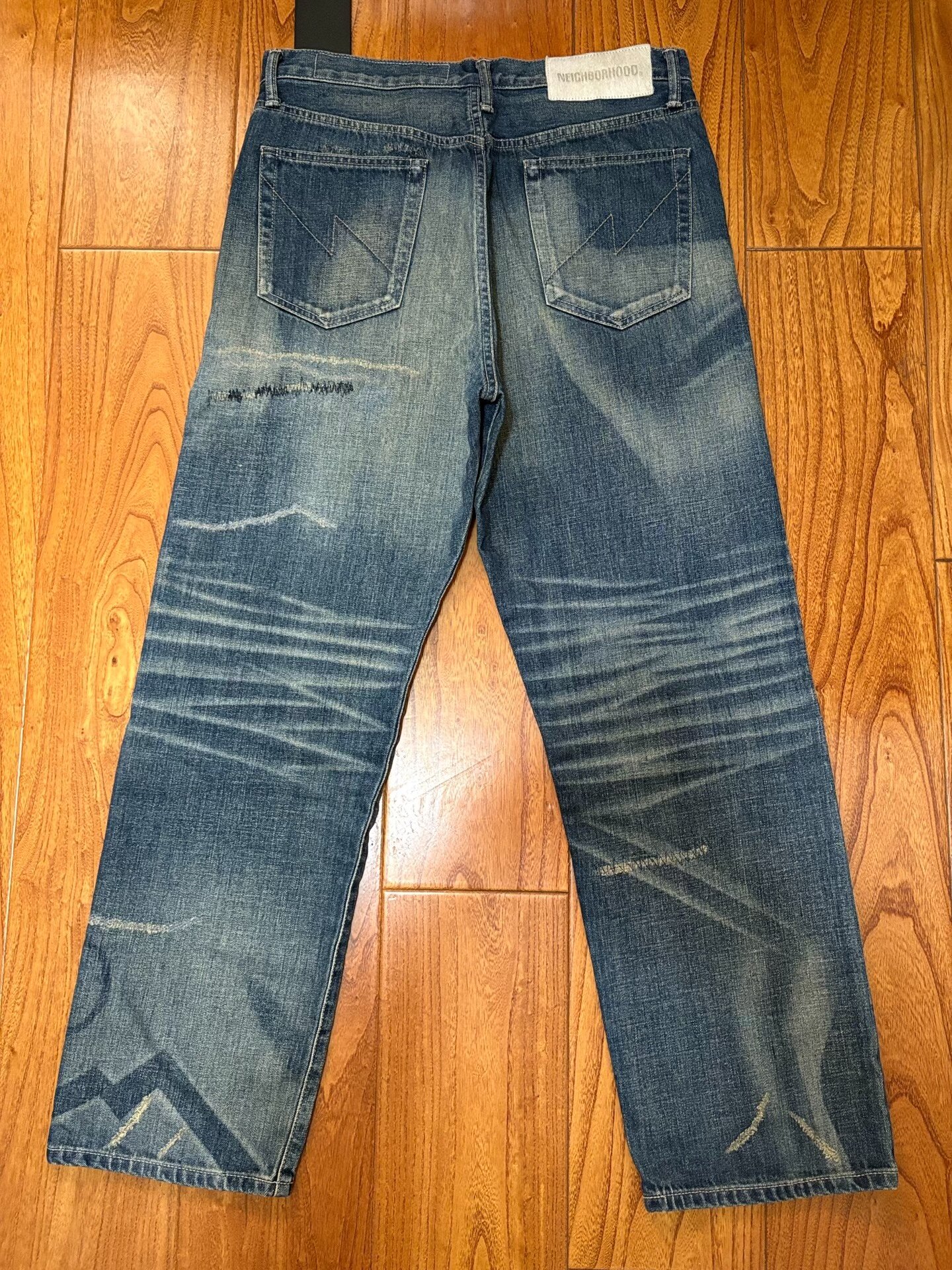 NEIGHBORHOOD SAVAGE DENIM Jeans — front