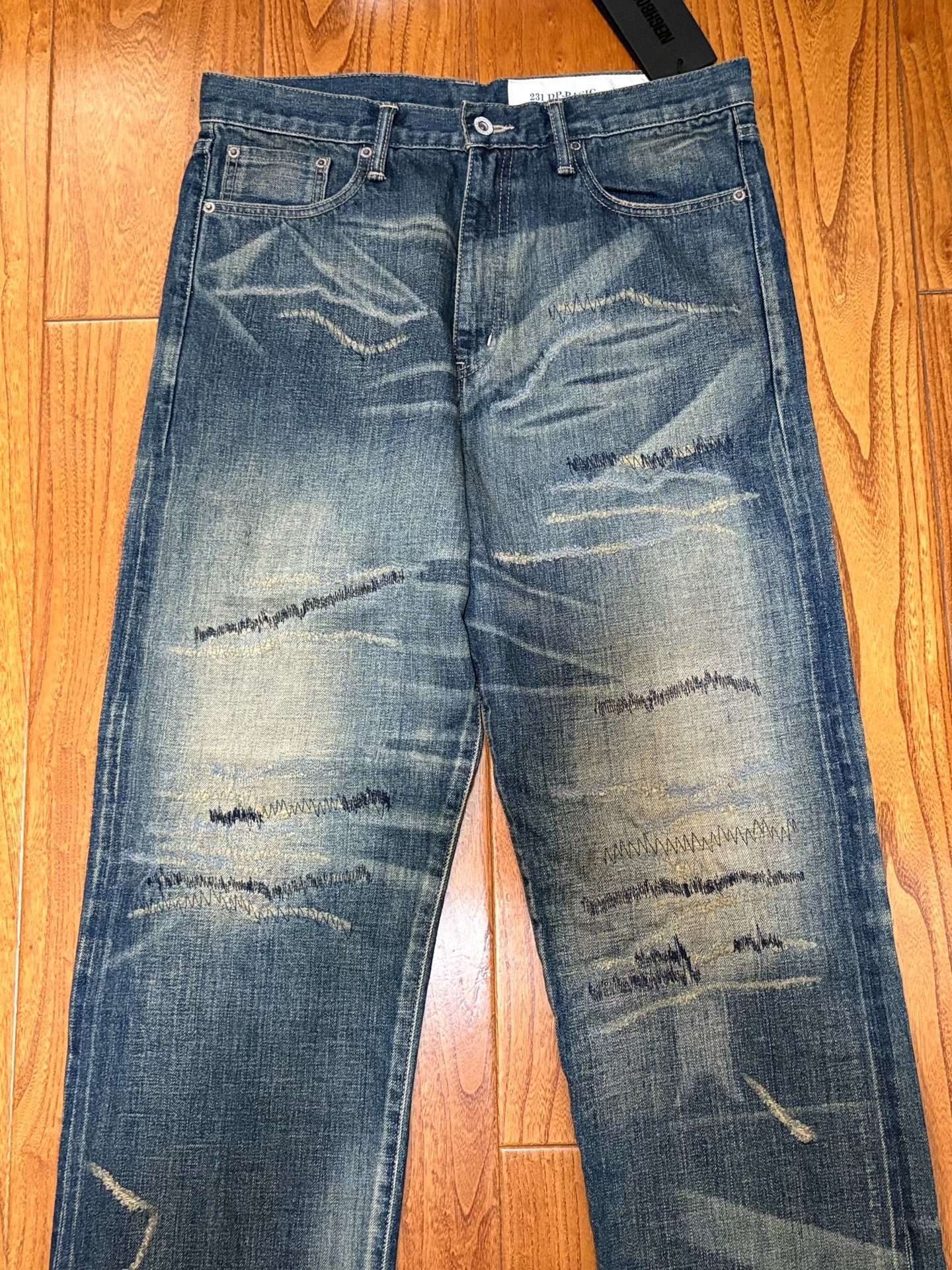 NEIGHBORHOOD SAVAGE DENIM Jeans — detail