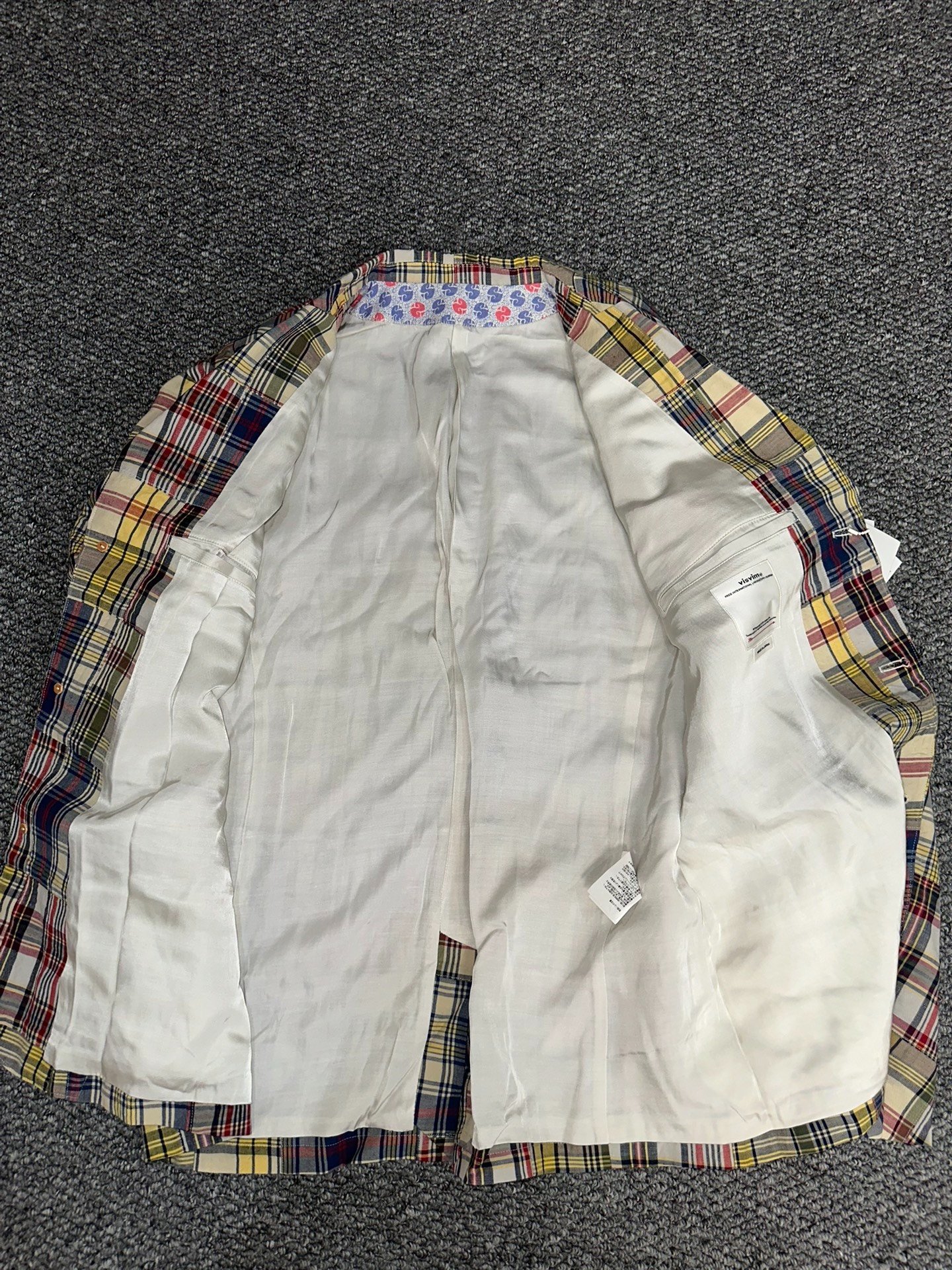 visvim bowen patchwork blazer — label