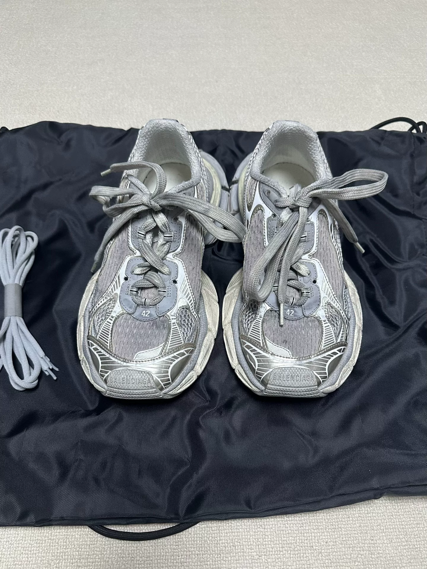 Balenciaga 3XL Low-Top Distressed Sneakers — front