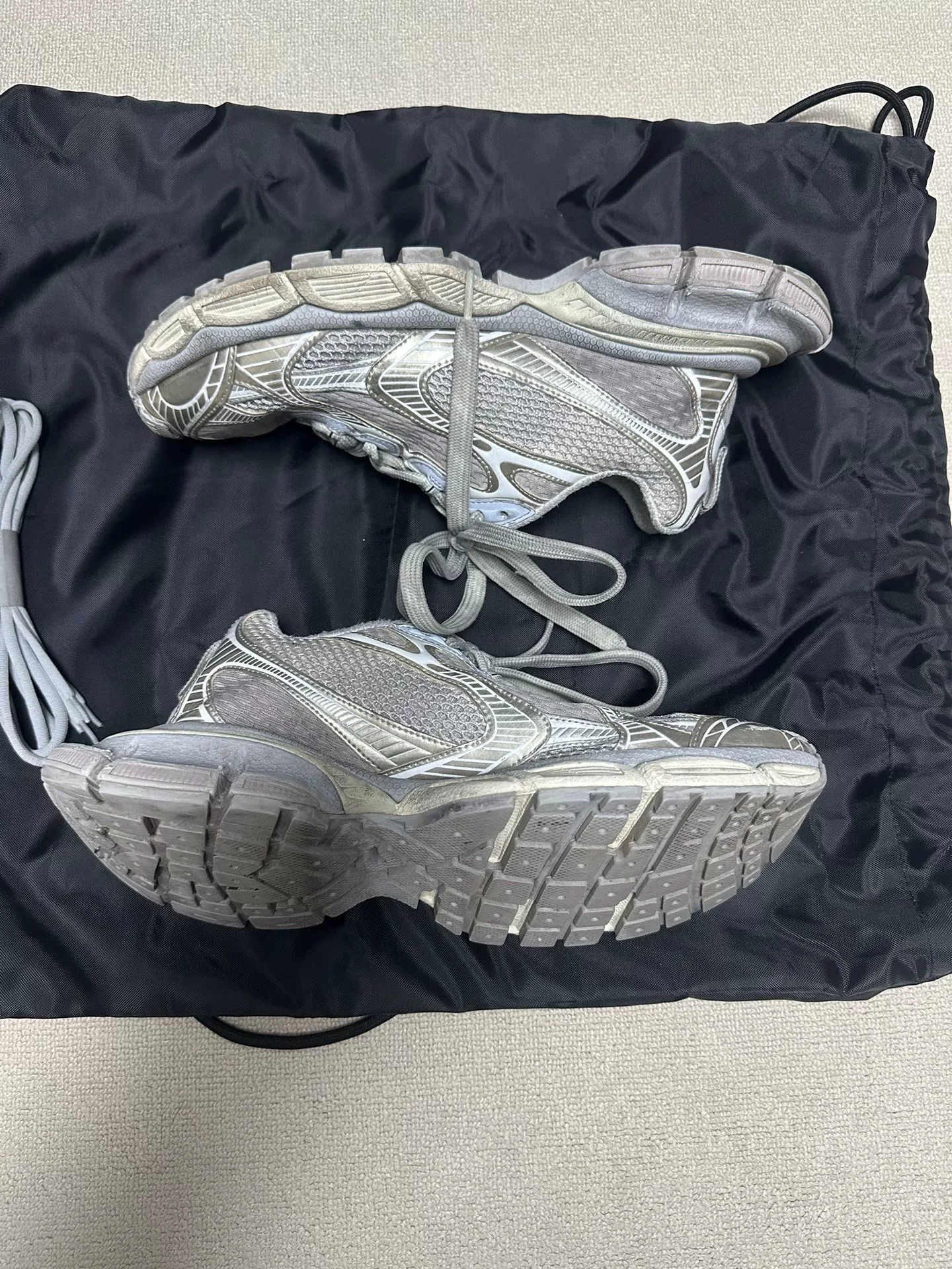 Balenciaga 3XL Low-Top Distressed Sneakers — label