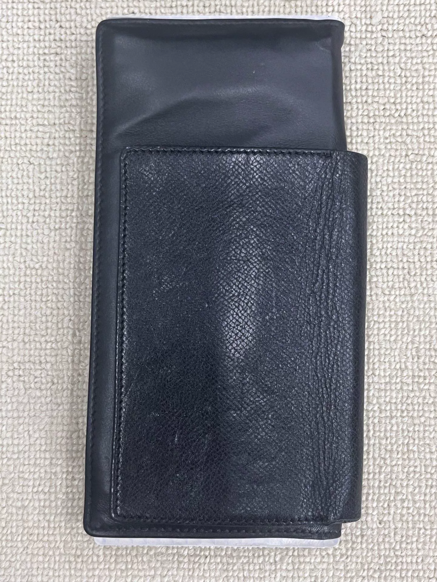Balenciaga Passport Logo Embossed Wallet — label