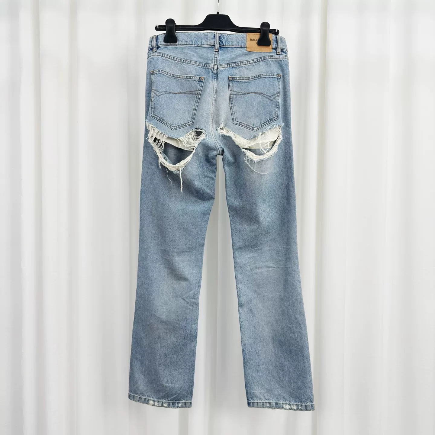 Balenciaga Washed Distressed Jeans — front
