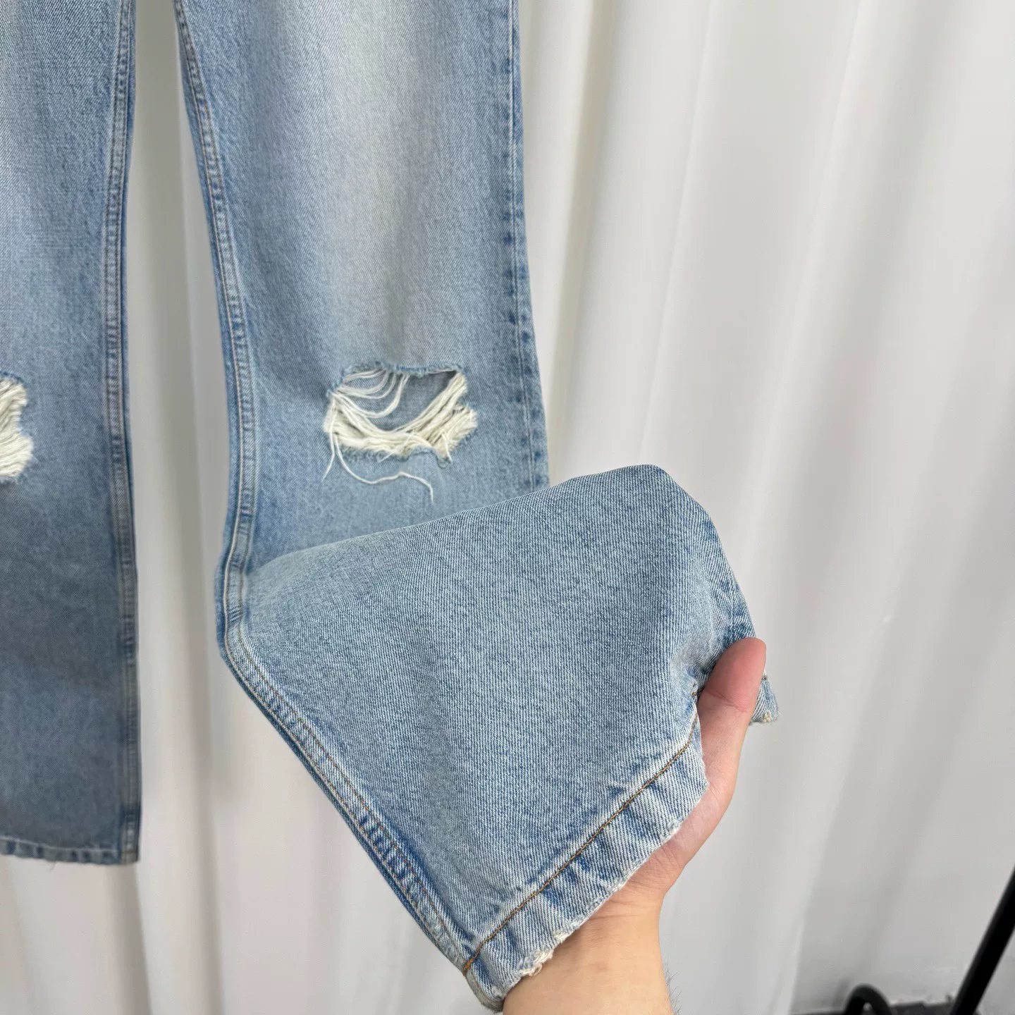 Balenciaga Washed Distressed Jeans — detail