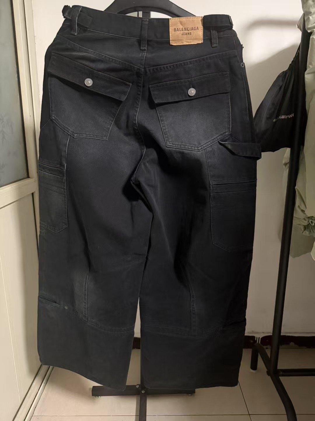 Balenciaga Washed Cargo Distressed Wide-Leg Jeans — front