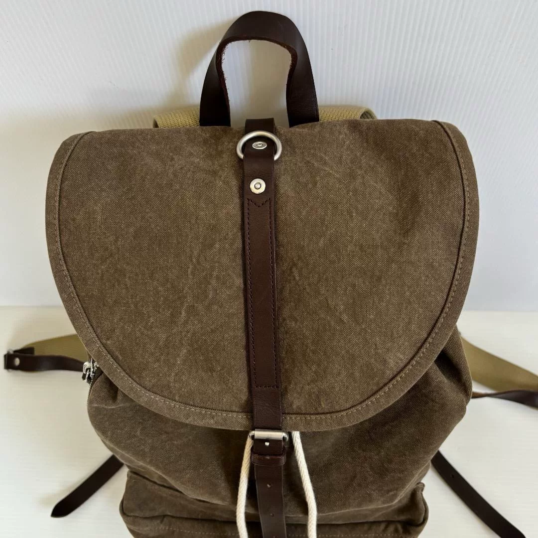 PORTER BRIDGE Khaki Canvas Backpack — label