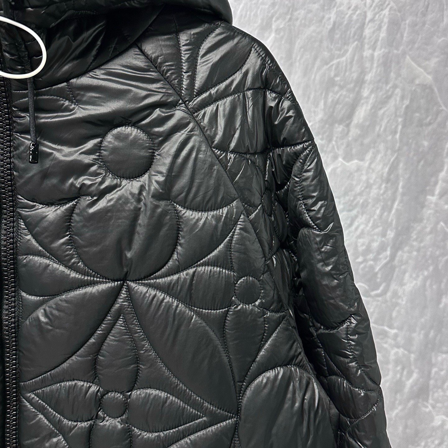 Louis Vuitton Monogram Quilted Hooded Jacket — detail