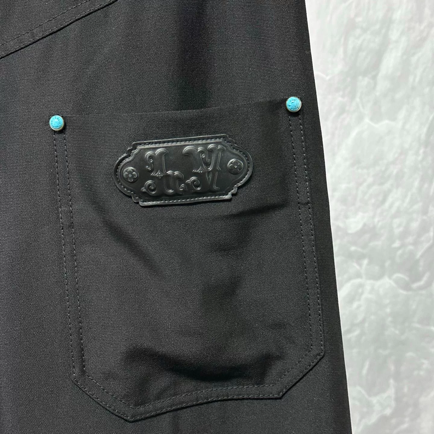 Louis Vuitton FW24 Turquoise Button Trousers — back