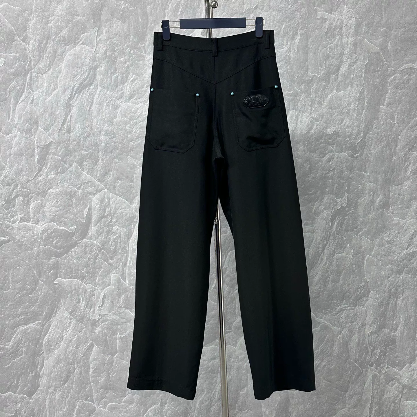 Louis Vuitton FW24 Turquoise Button Trousers — label