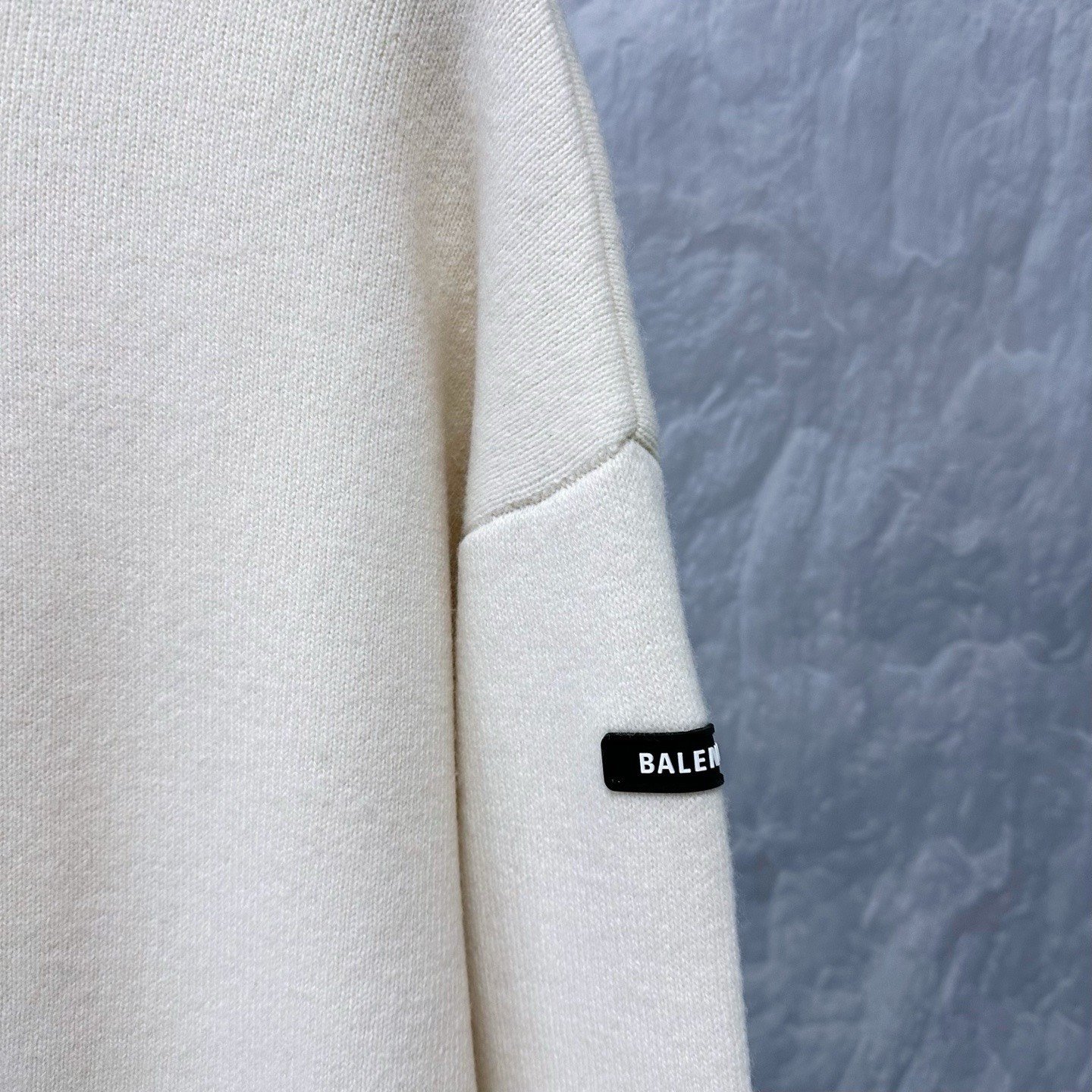 Balenciaga Rubber Label Dropped Shoulder Wool Sweater — detail