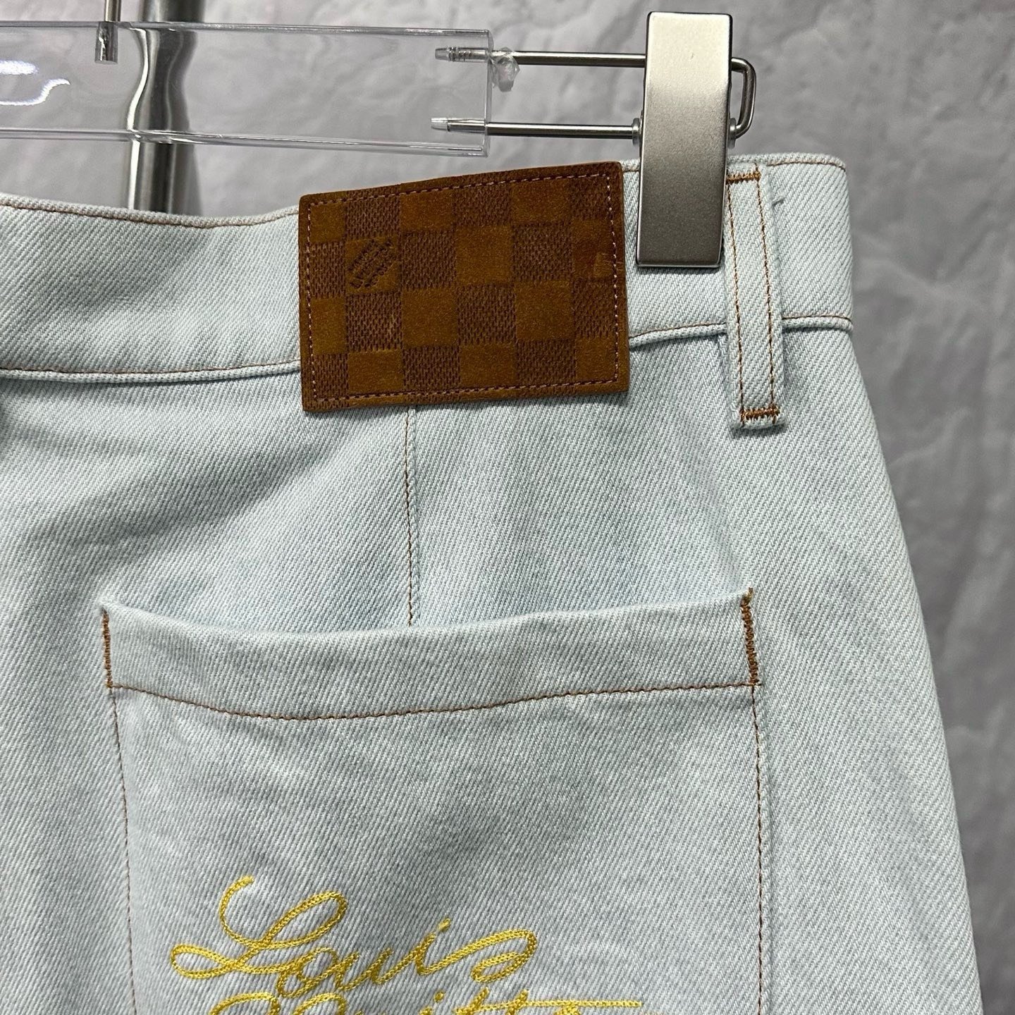 Louis Vuitton Embroidered Logo Rivet Denim Shorts — detail