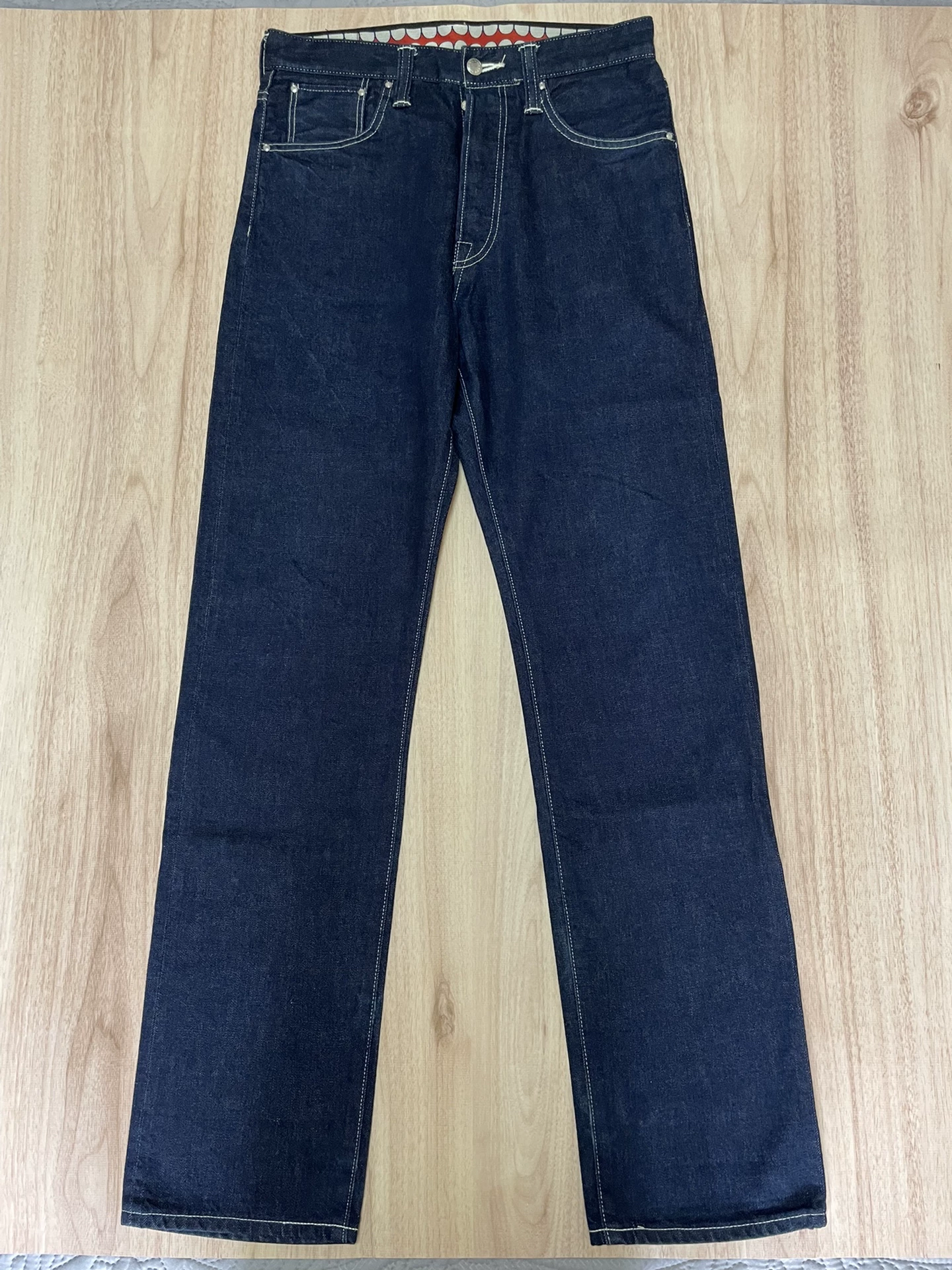 OriginalFake KAWS Raw Denim Jeans