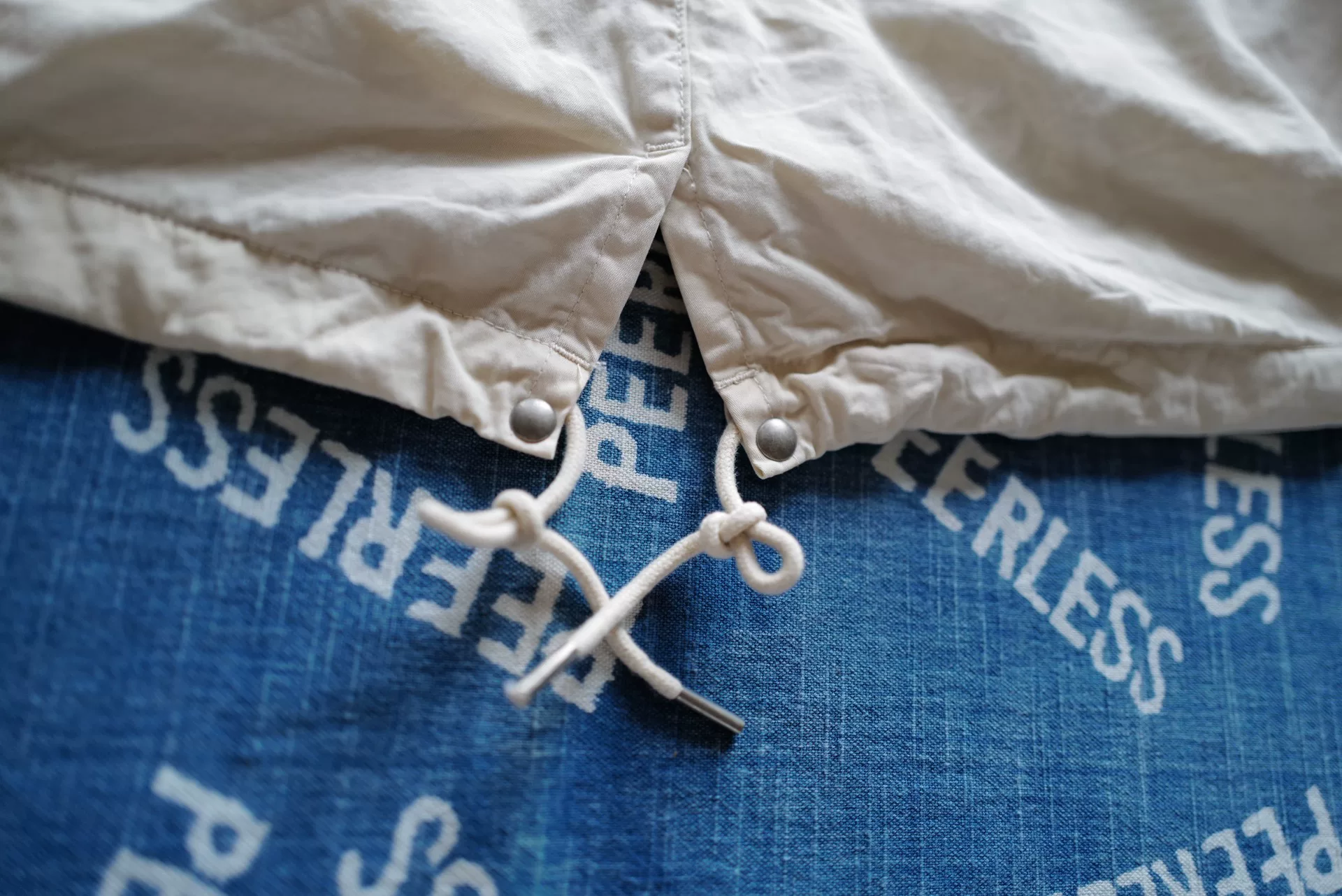 visvim 22AW Dorset Fishtail Parka Ivory — label
