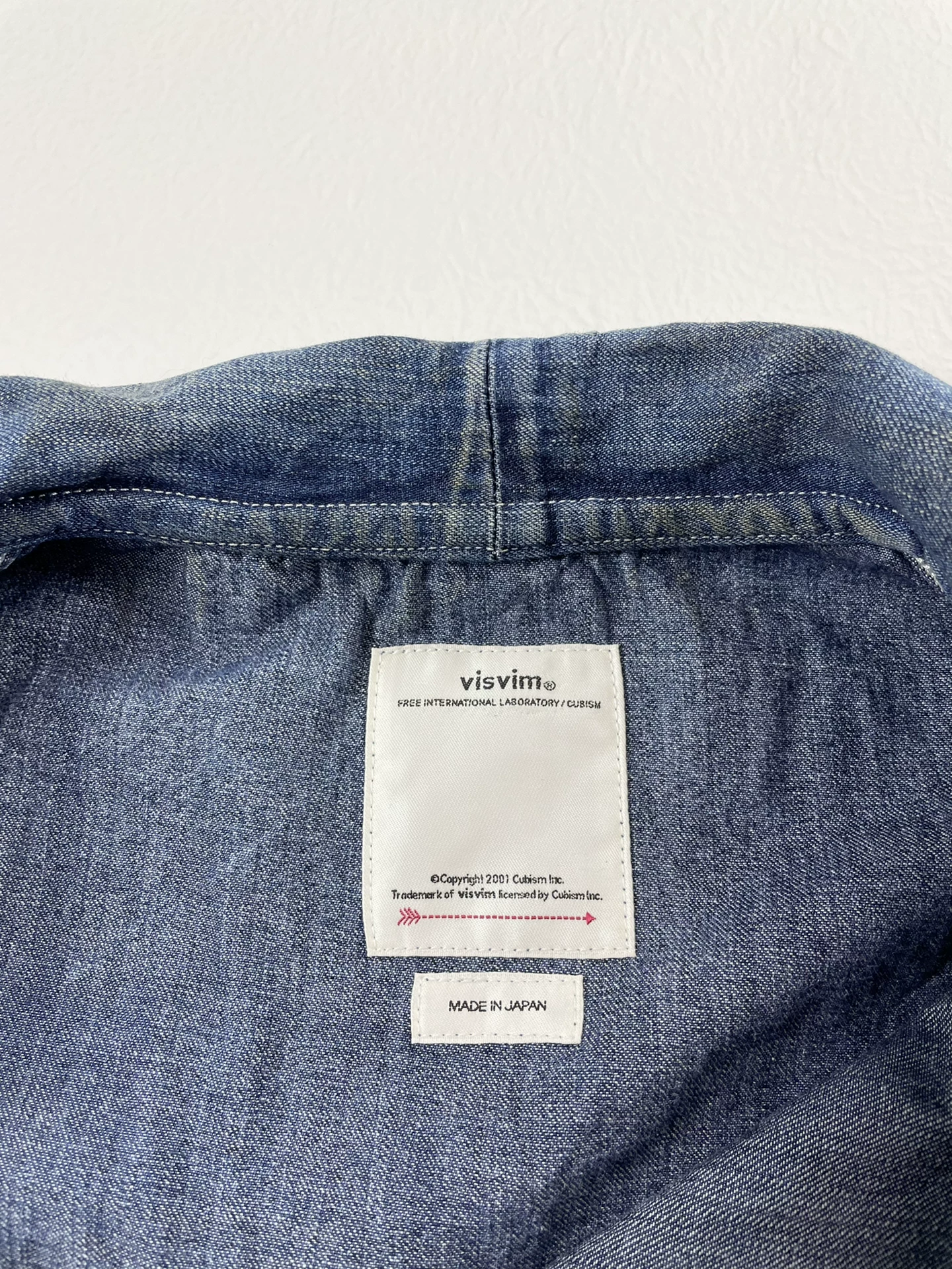VISVIM Bucky Coverall Dry Denim Jacket — label