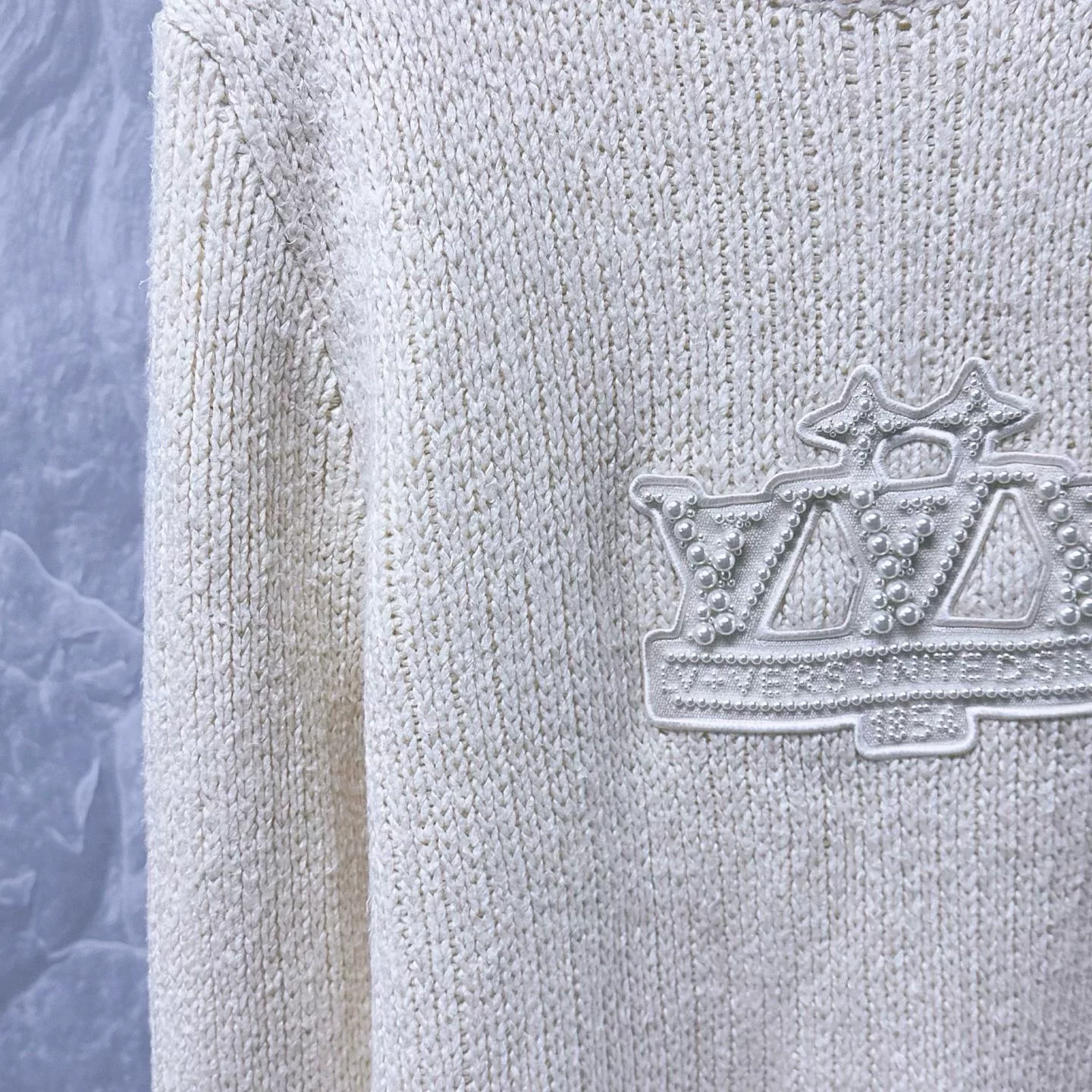 Louis Vuitton SS25 Pearl Letter Knit Sweater — detail
