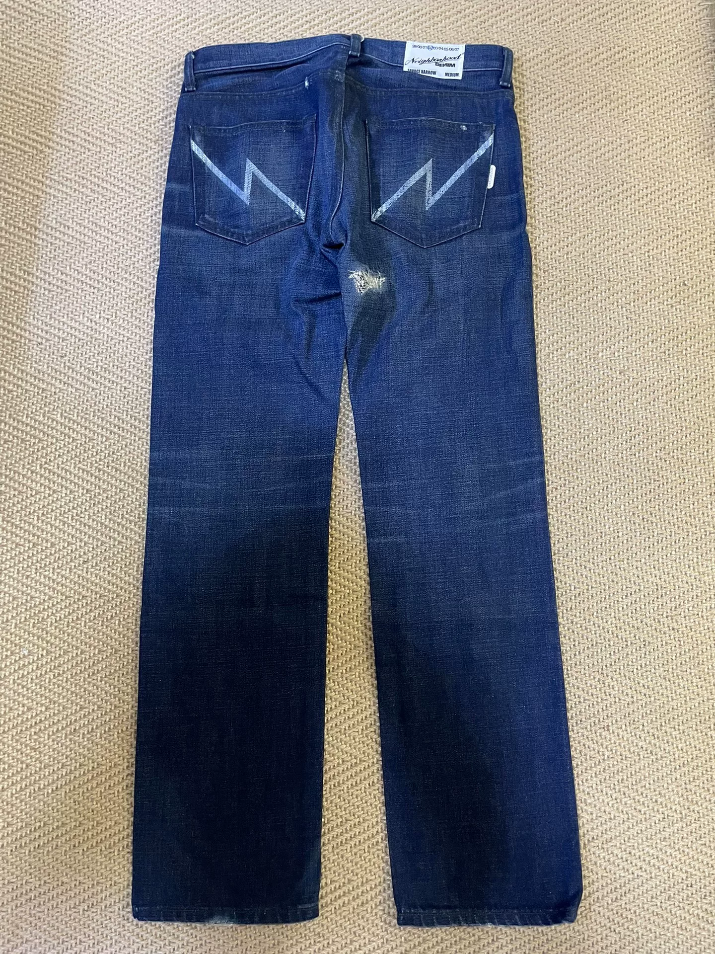 NEIGHBORHOOD Early Distressed Jeans — front