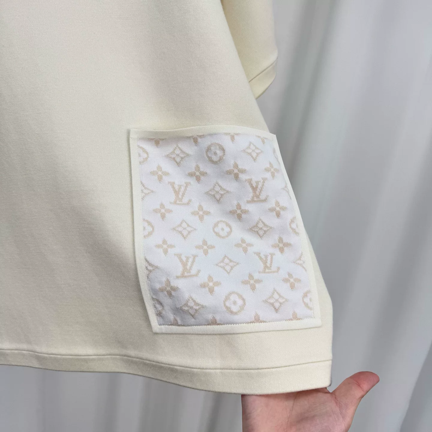 Louis Vuitton Cream Embossed Pocket Knit Top — label