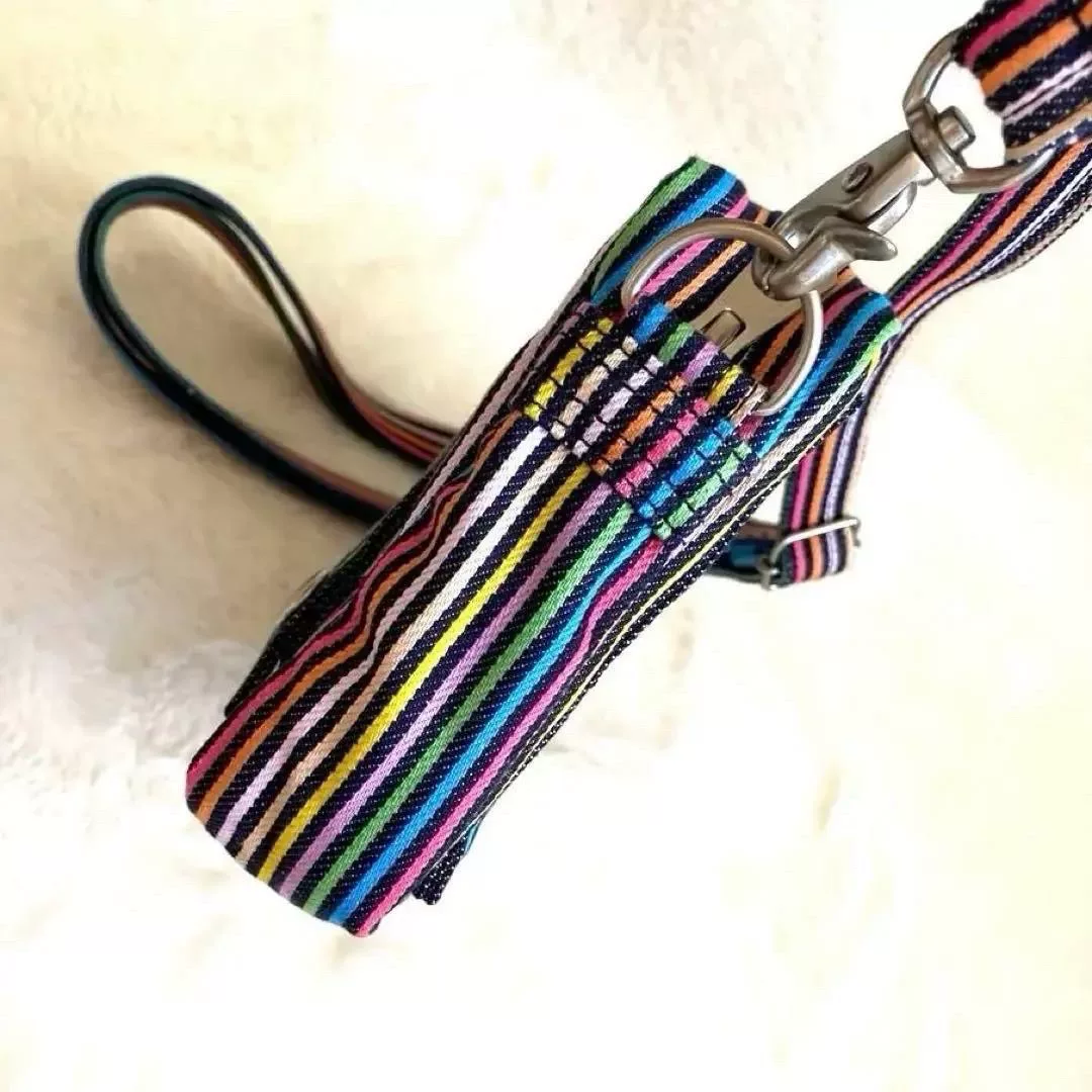 POTER × SLAP SHOT Rainbow Stripe Crossbody — label