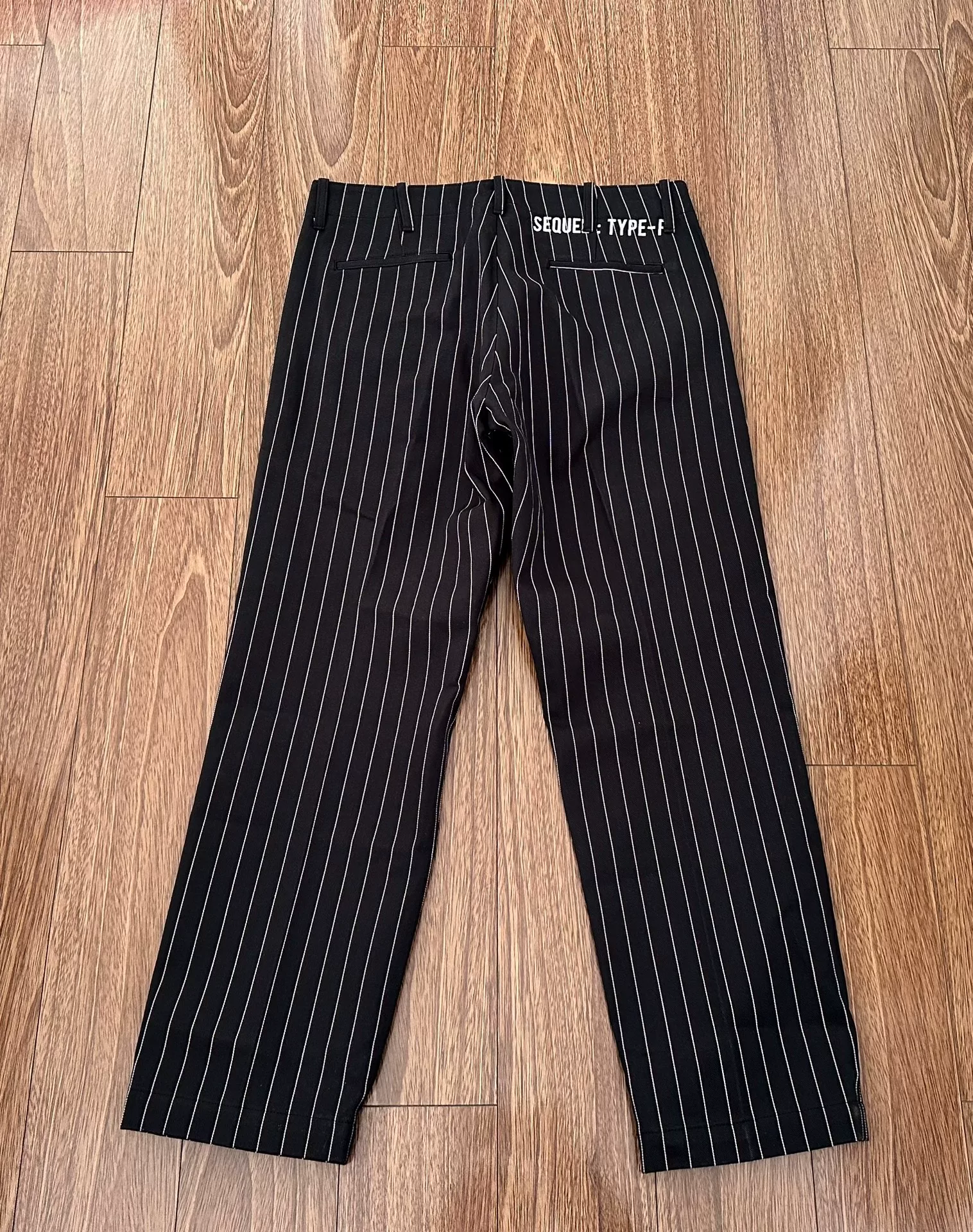 Sequel Fragment Black Stripe Chino Pants — front