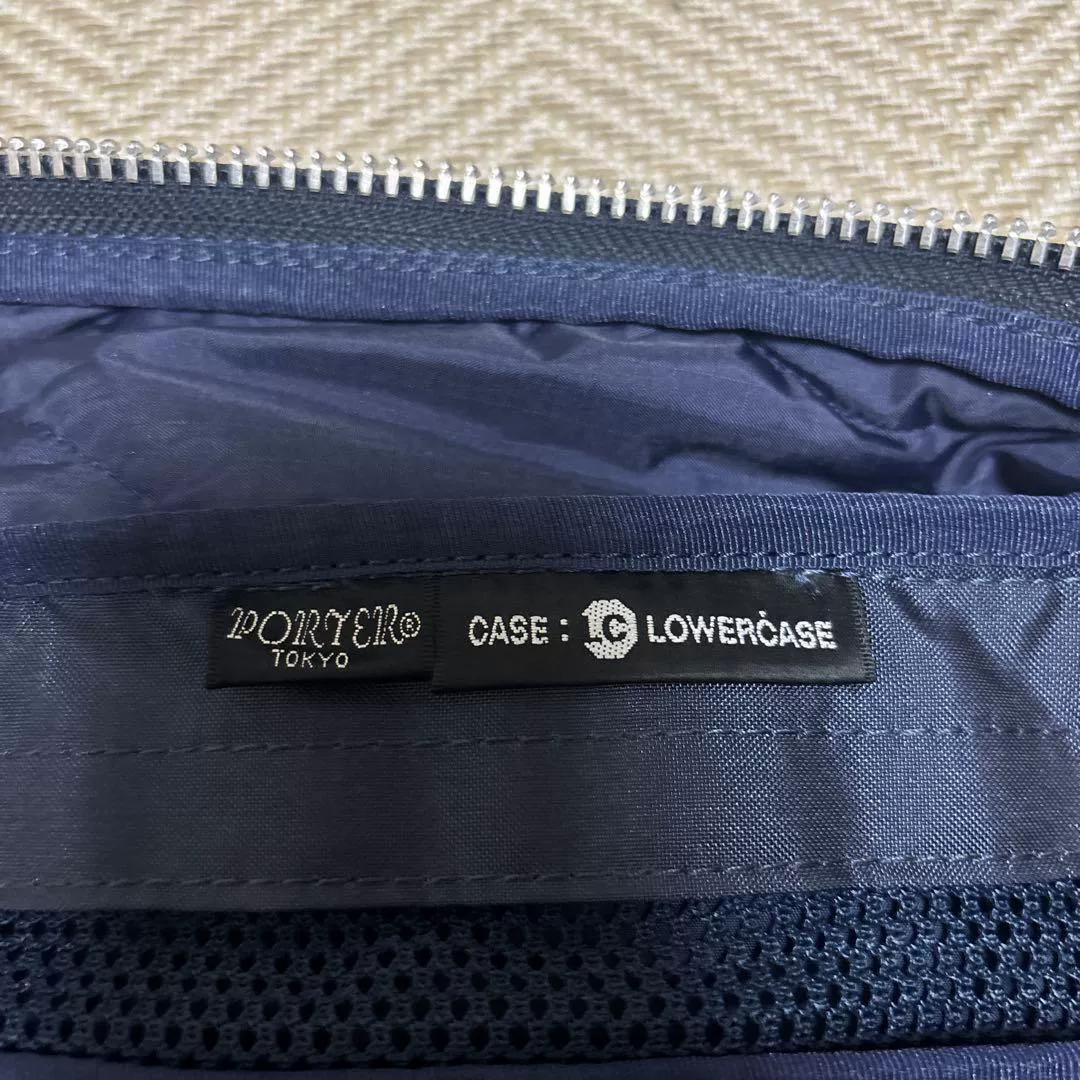 PORTER Navy Nylon Boston Bag — label