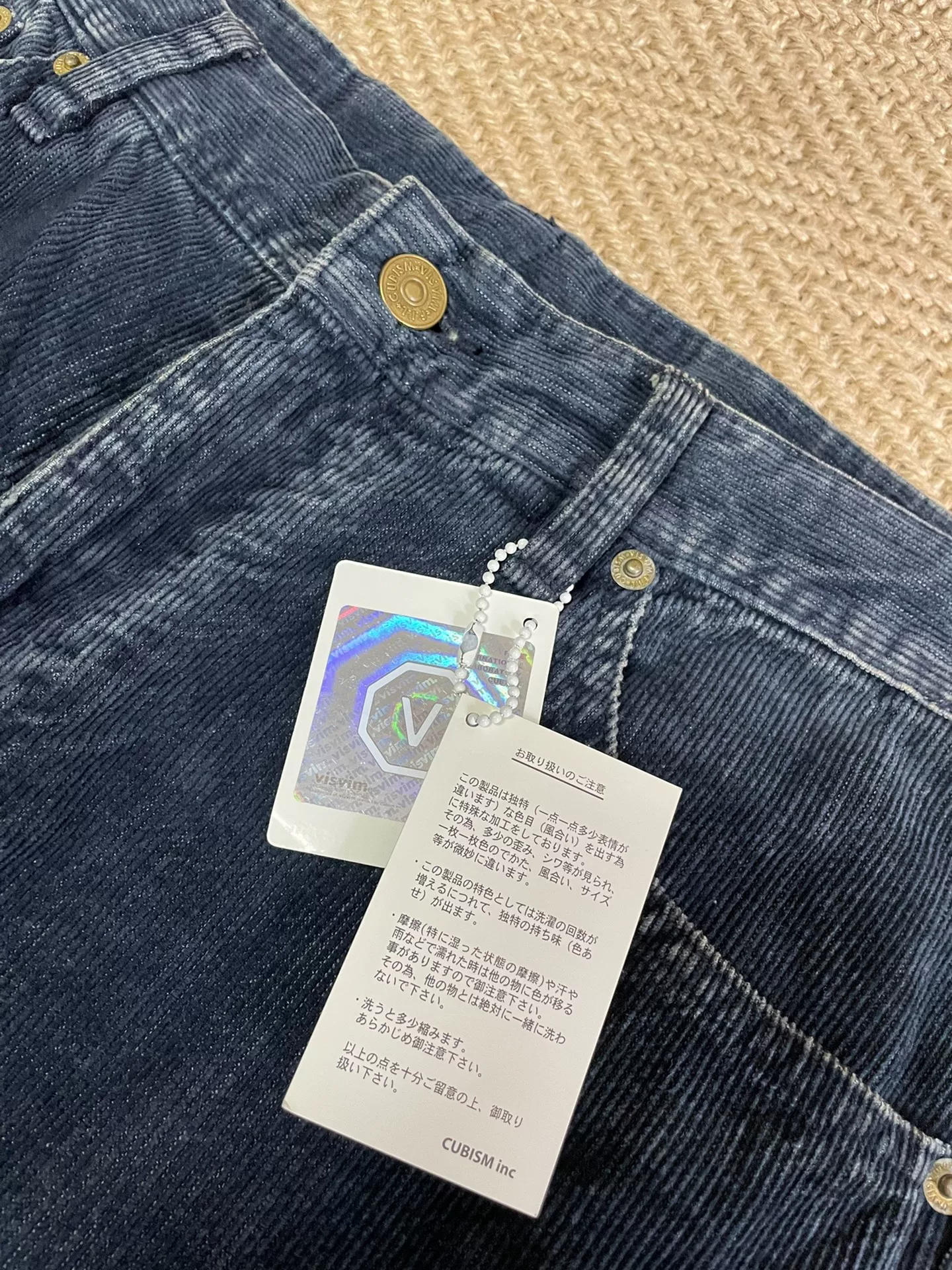 VISVIM FULXUS KANO Indigo Washed Corduroy Pants — label