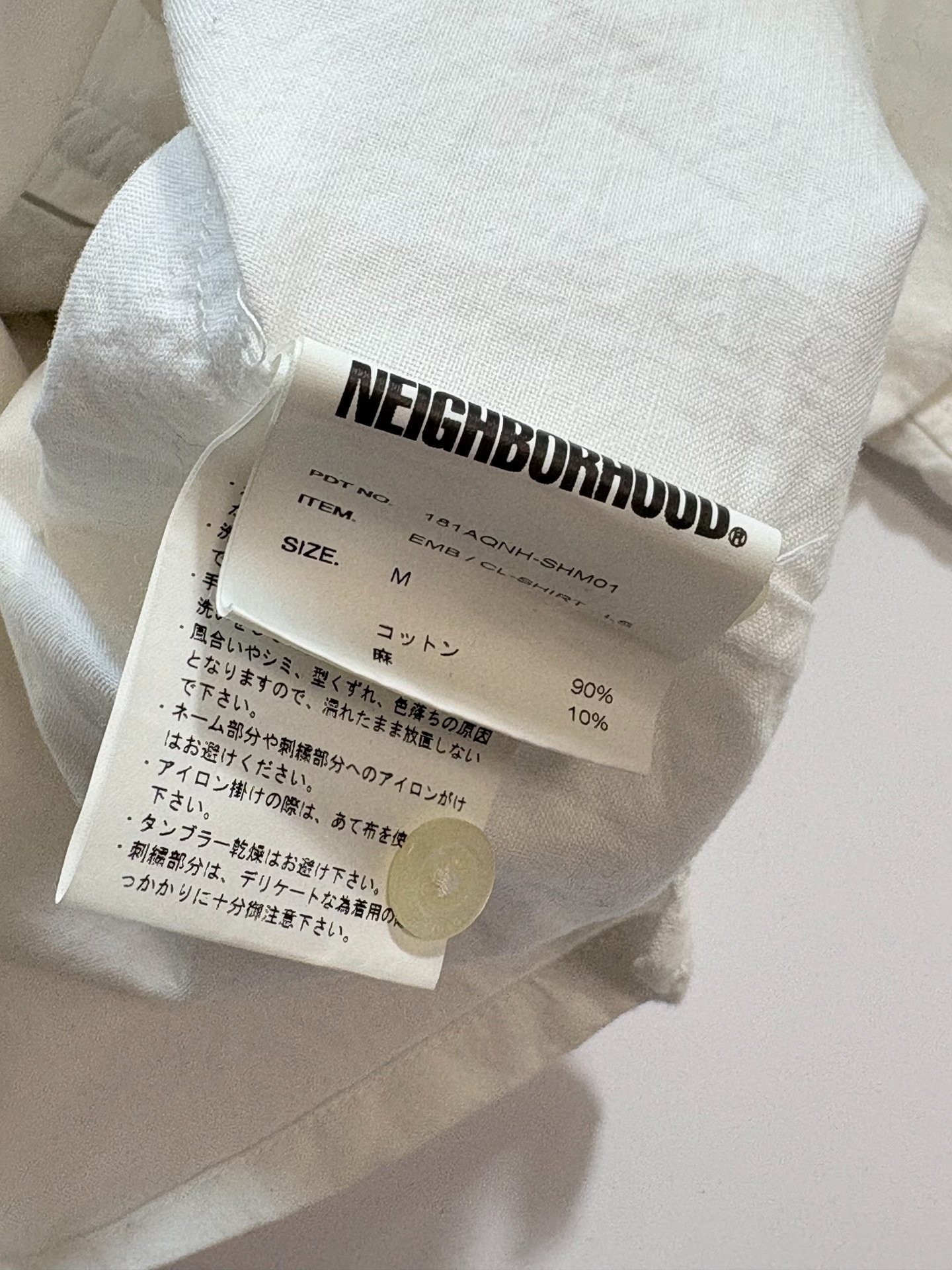 NEIGHBORHOOD Ethnic Embroidery Long-Sleeve Shirt — label