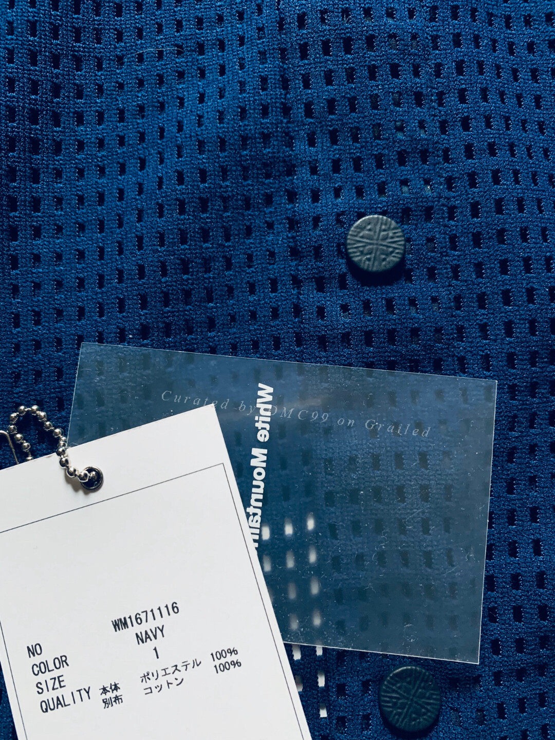 White Mountaineering Poncho Shirt — label