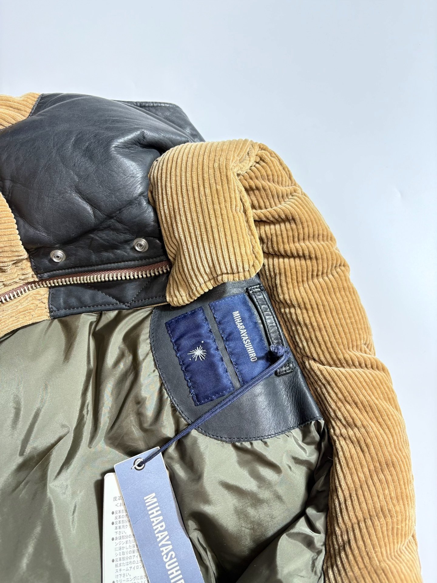 MIHARYA SUHIRO Leather-Corduroy Down Vest — detail