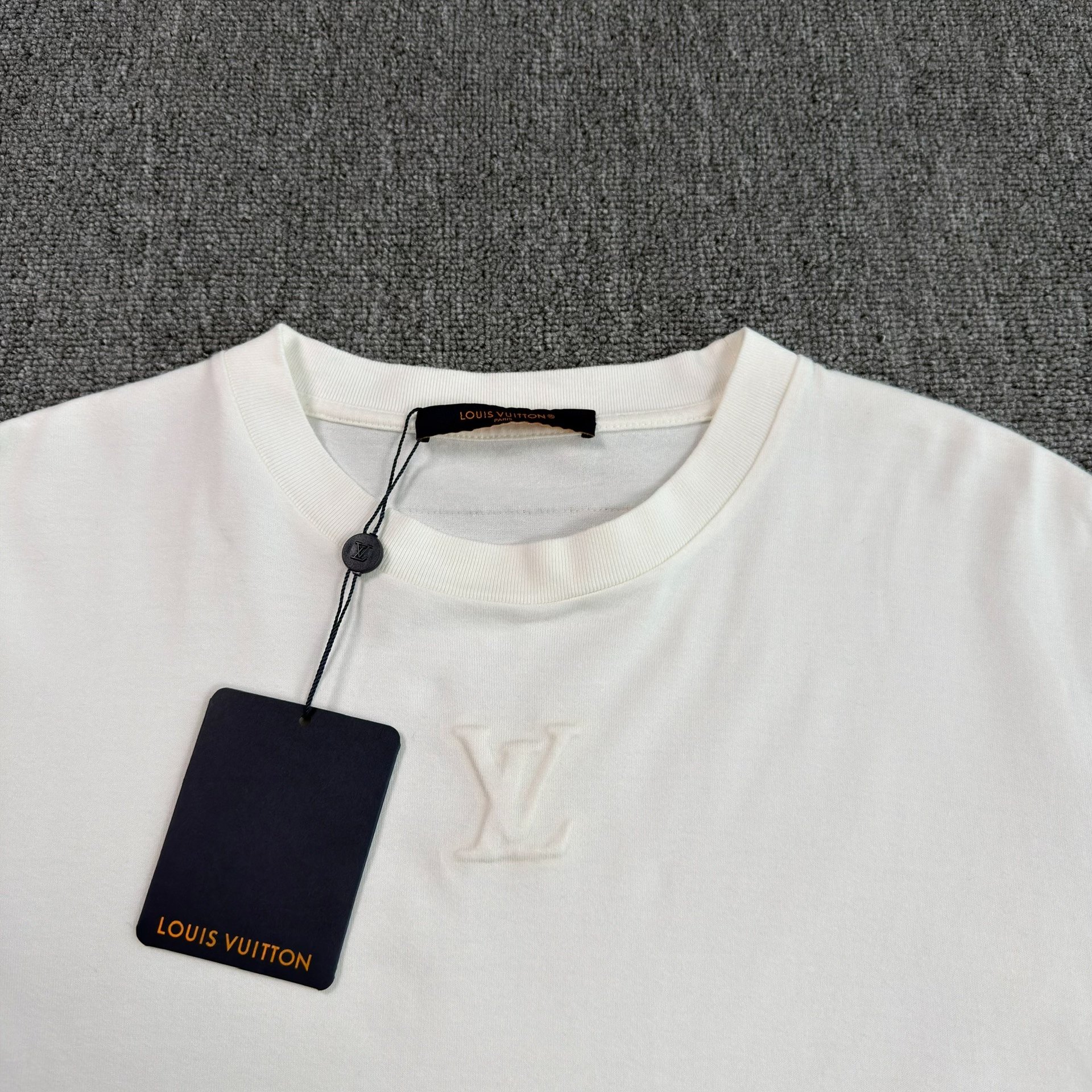 Louis Vuitton White Embossed Logo T-shirt — detail