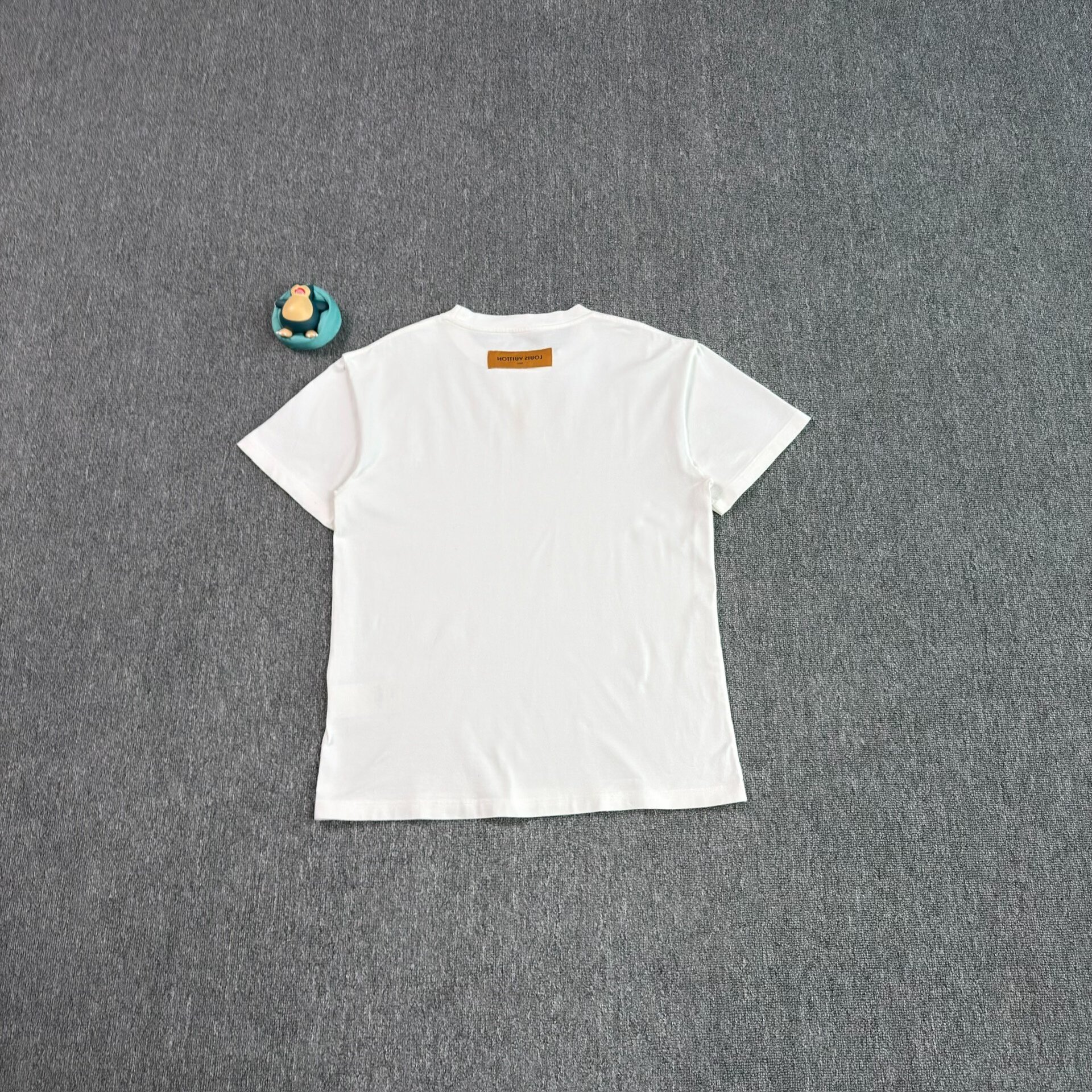 Louis Vuitton White Embossed Logo T-shirt — front