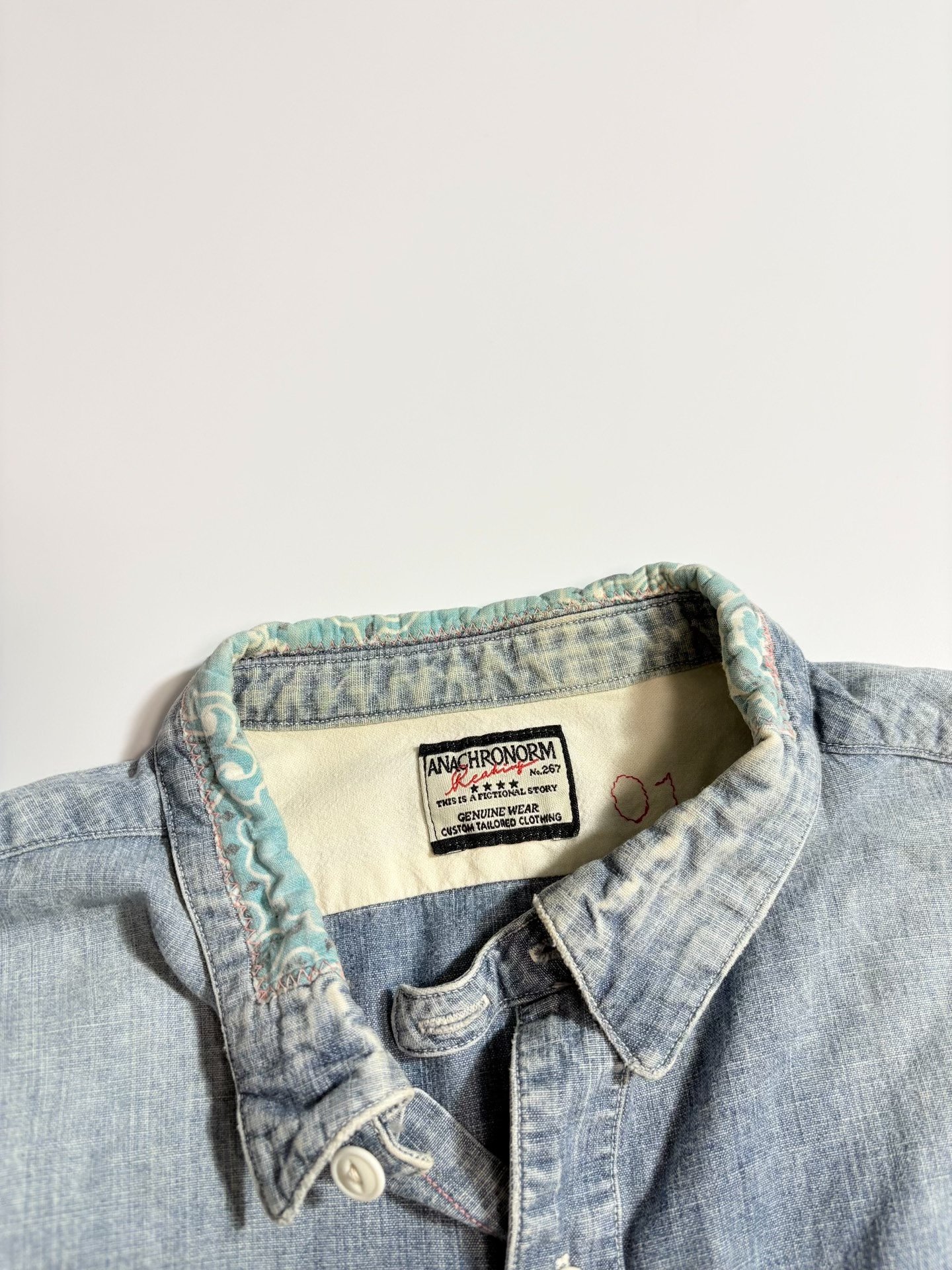 ANACHRONORM Distressed Denim Shirt — label