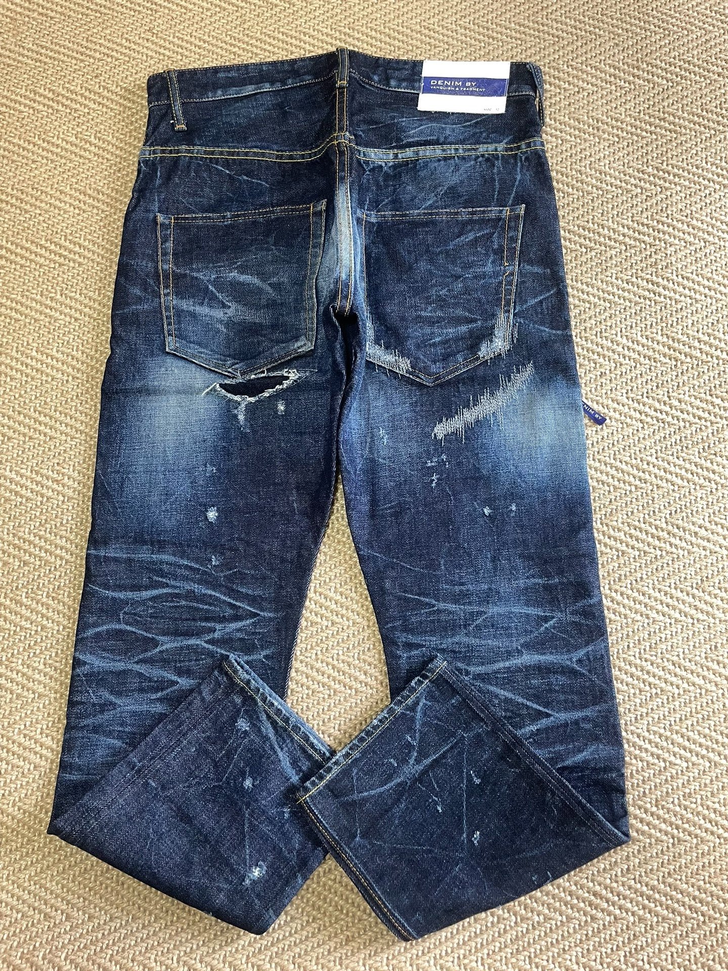 Vanquish Fragment Distressed Denim Jeans — front