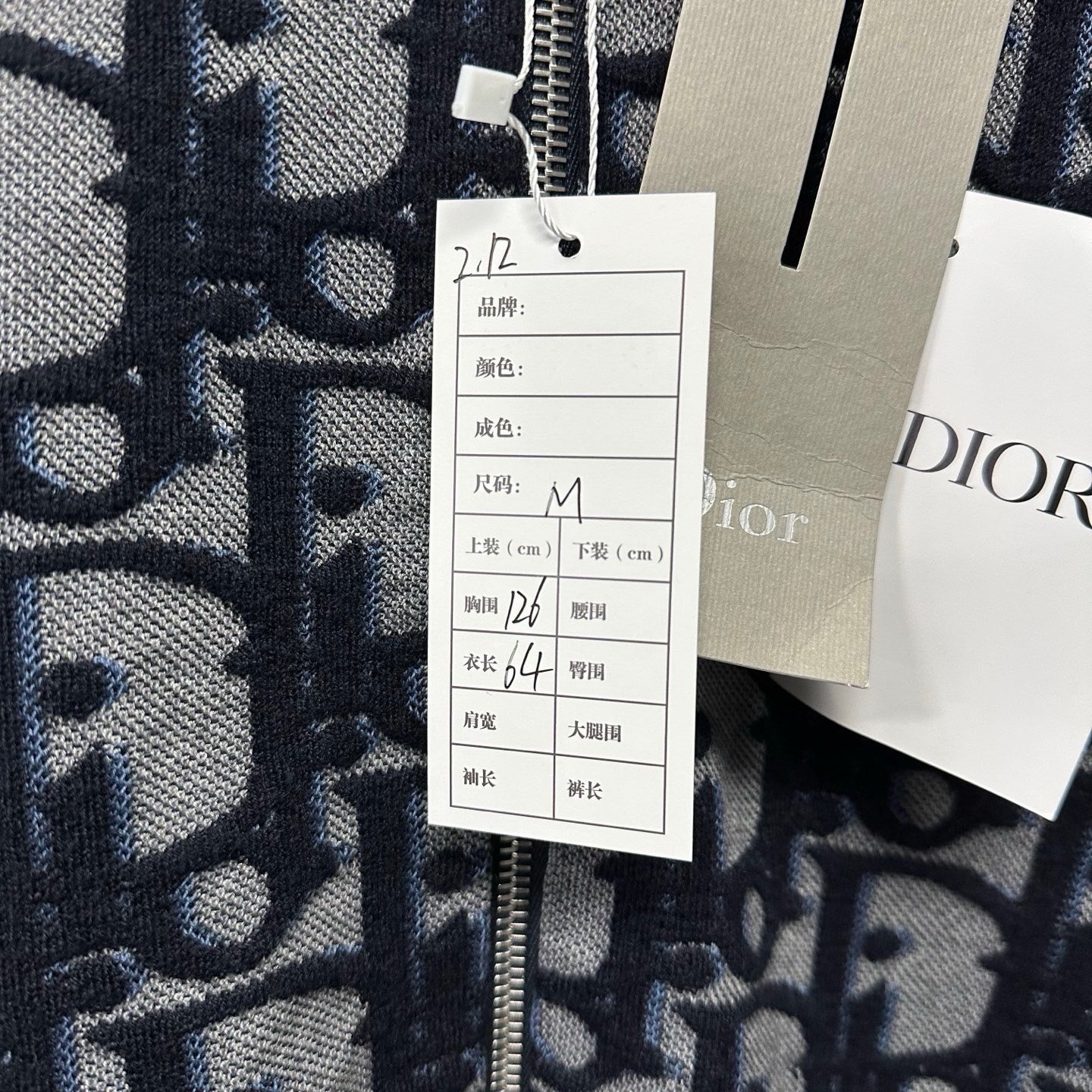 Dior SS26 All-Over D Logo Bomber Jacket — label