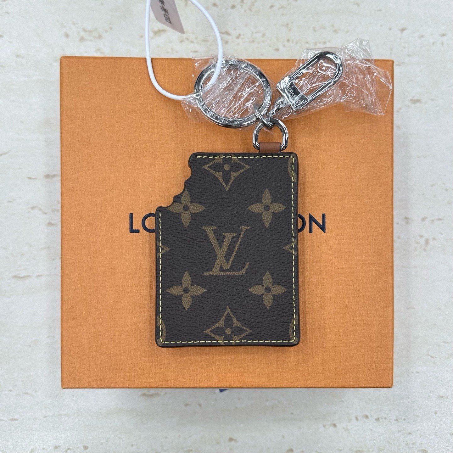 Louis Vuitton Chocolate Keychain — detail