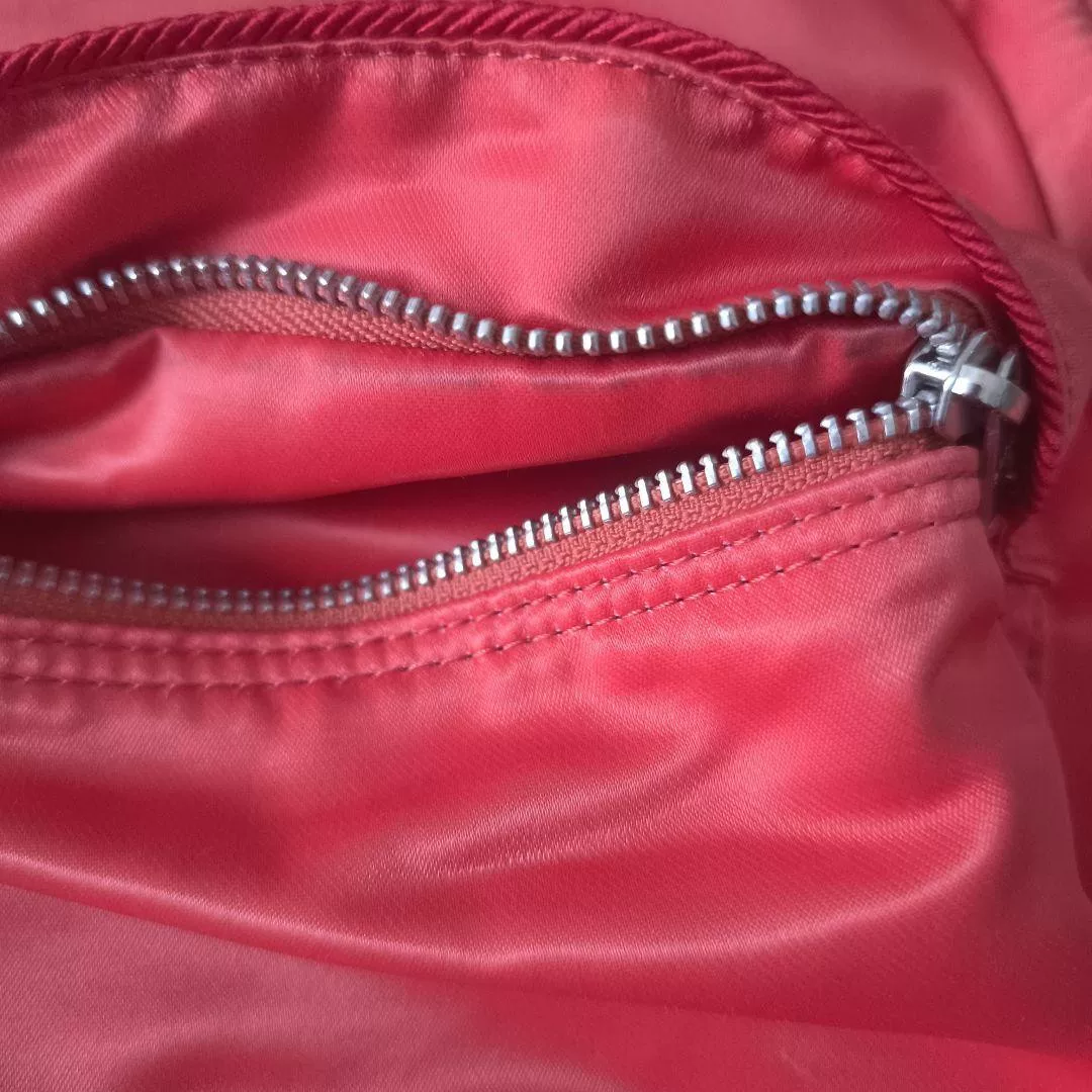 Porter Fade Pink Backpack — label
