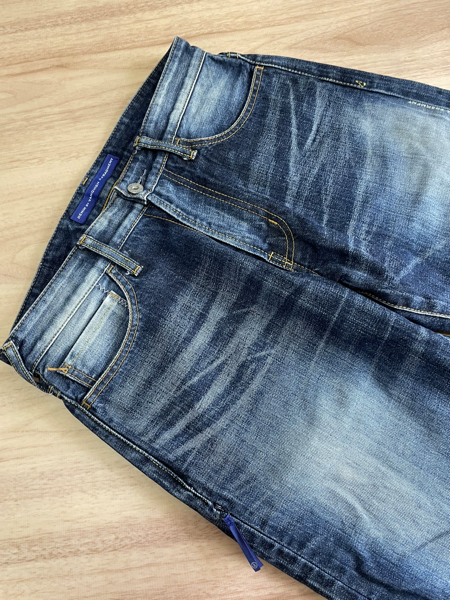 Vanquish Fragment Distressed Denim Jeans — label