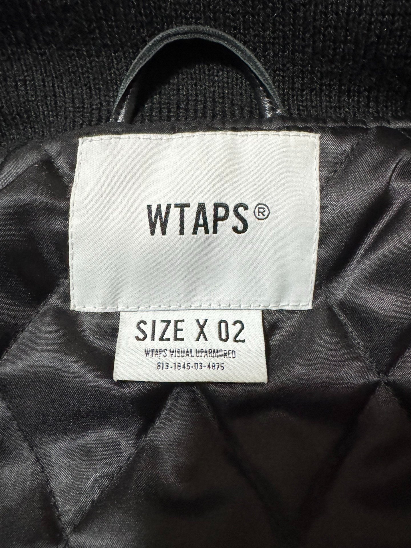 WTAPS 22AW Limited Leather Sleeve Baseball Jacket — back