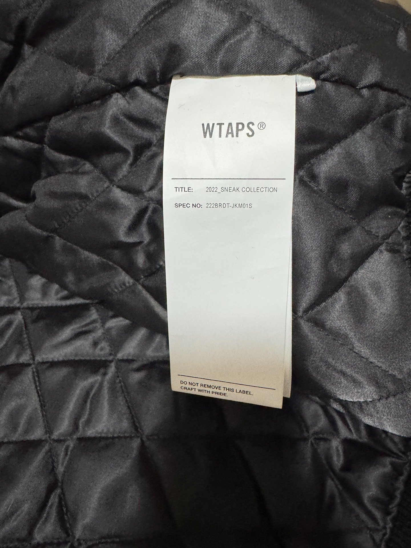 WTAPS 22AW Limited Leather Sleeve Baseball Jacket — label