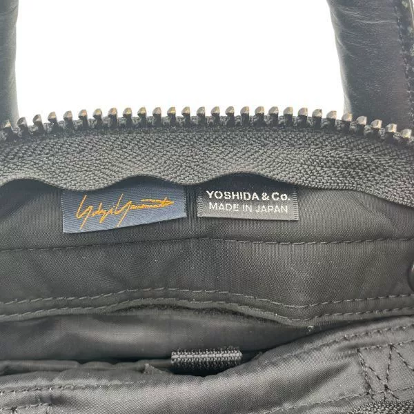 PORTER Yohji Yamamoto 85th Anniv 2WAY Bag — label