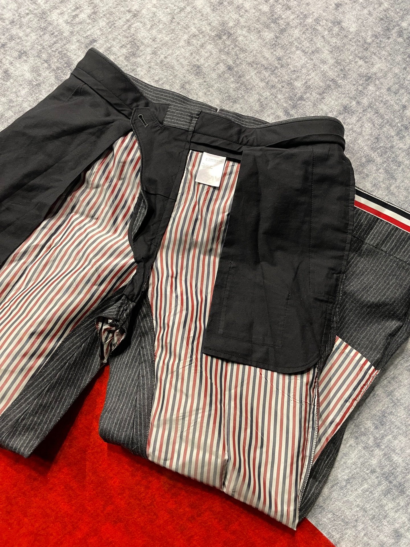 Thom Browne Gray Striped Wool Trousers — label