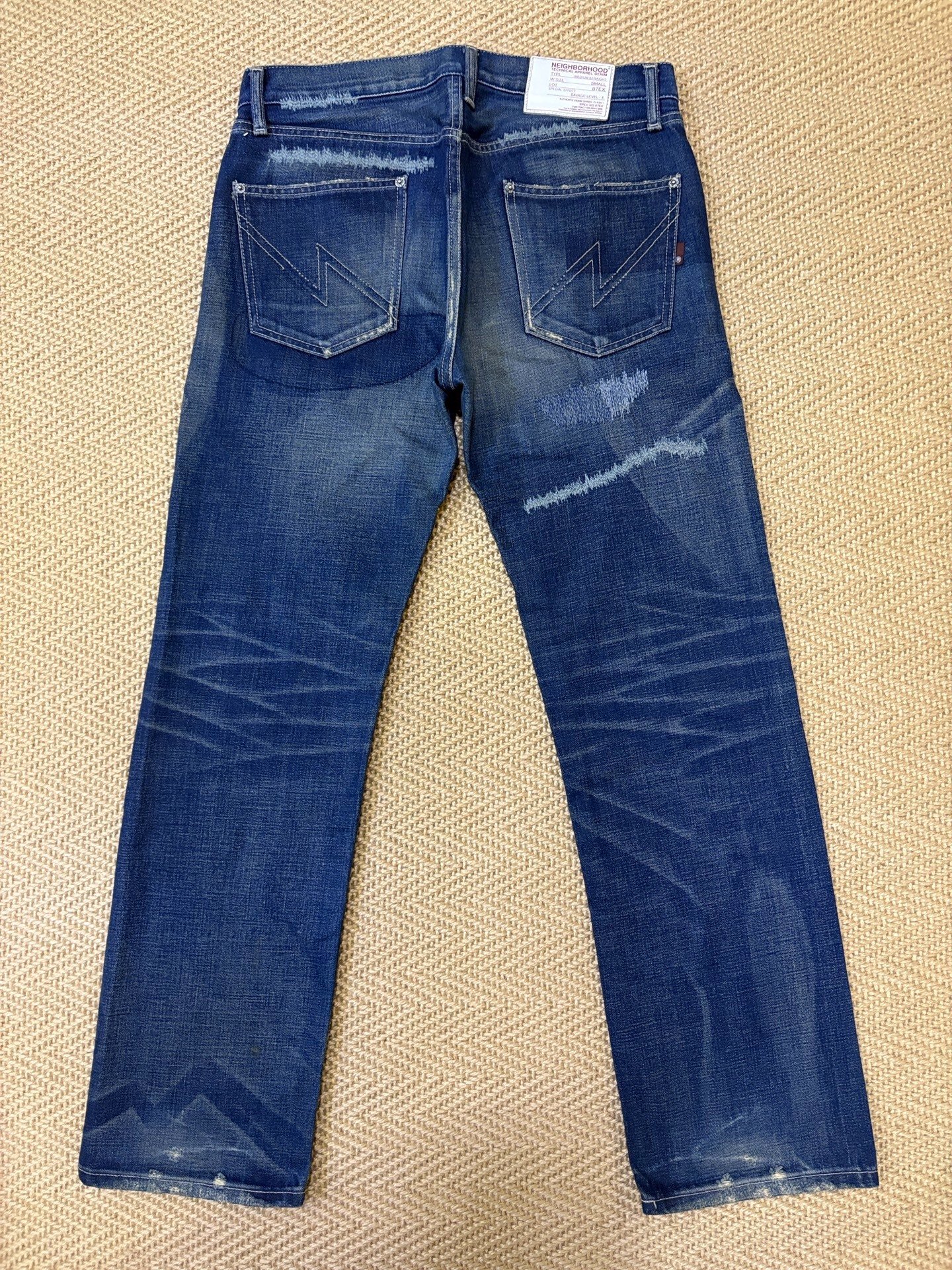 Neighborhood 07 SCAB Distressed Jeans — front