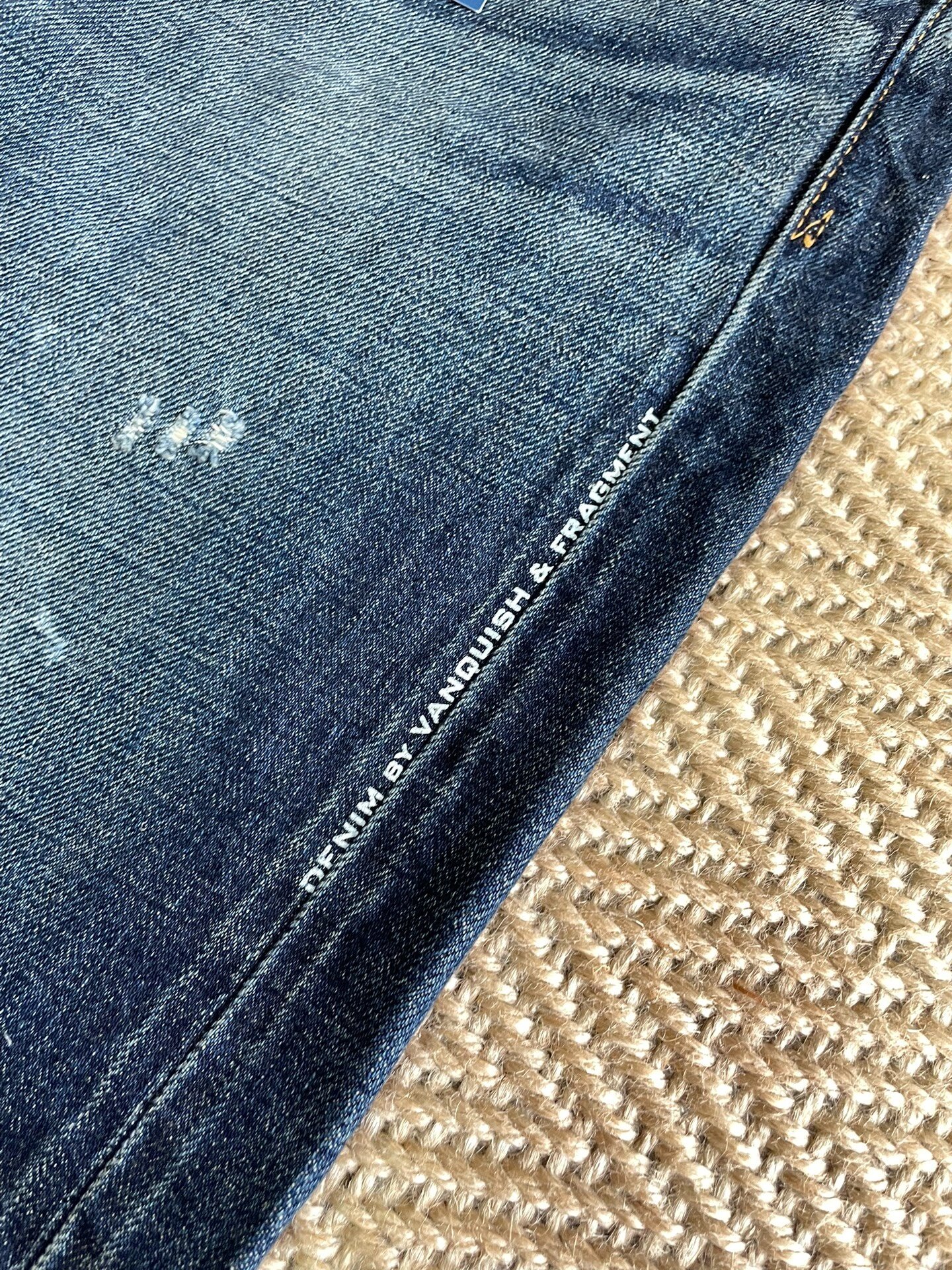 Vanquish & Fragment Lightning Denim Jeans — label