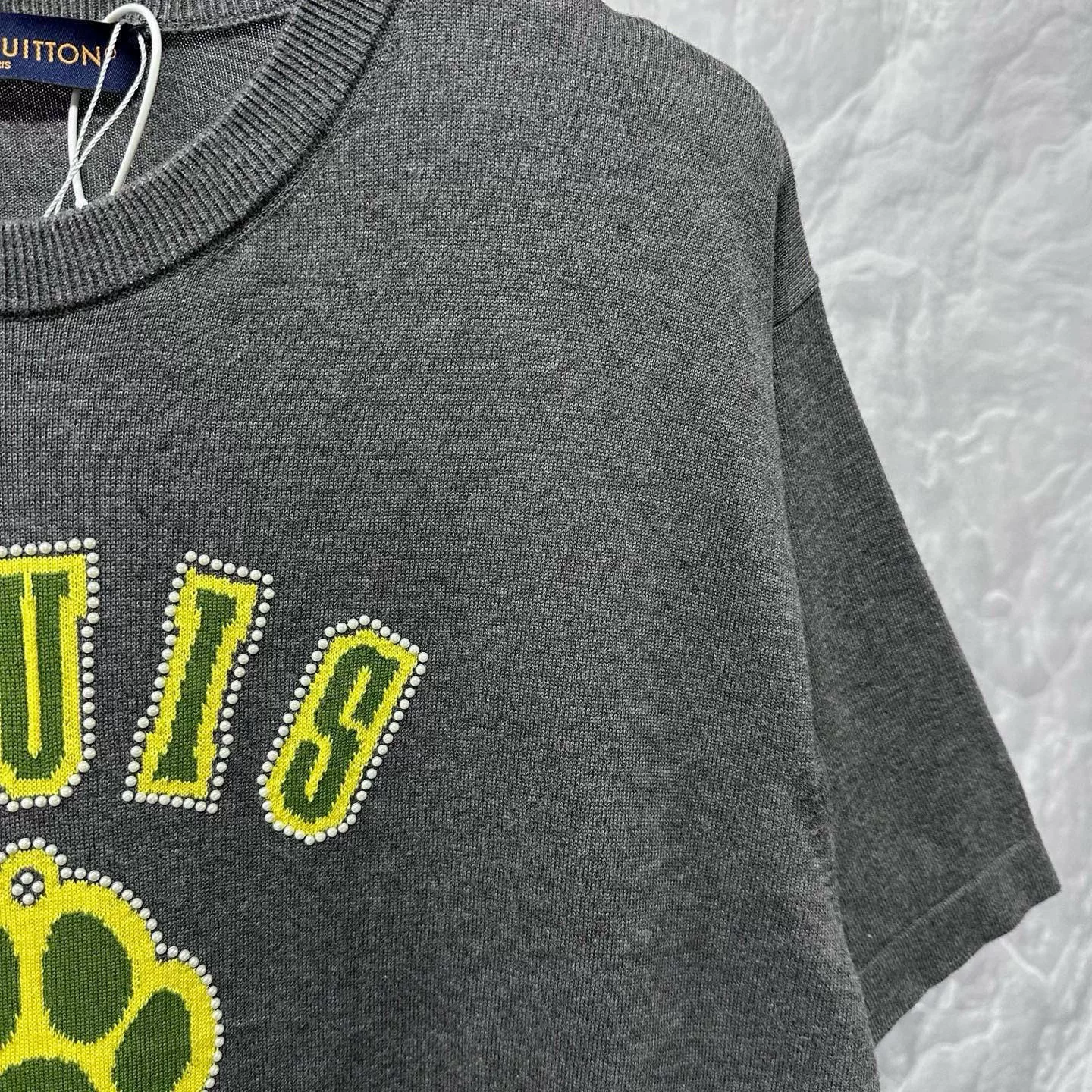 Louis Vuitton SS25 Dog Beaded Logo Knit Tee — detail